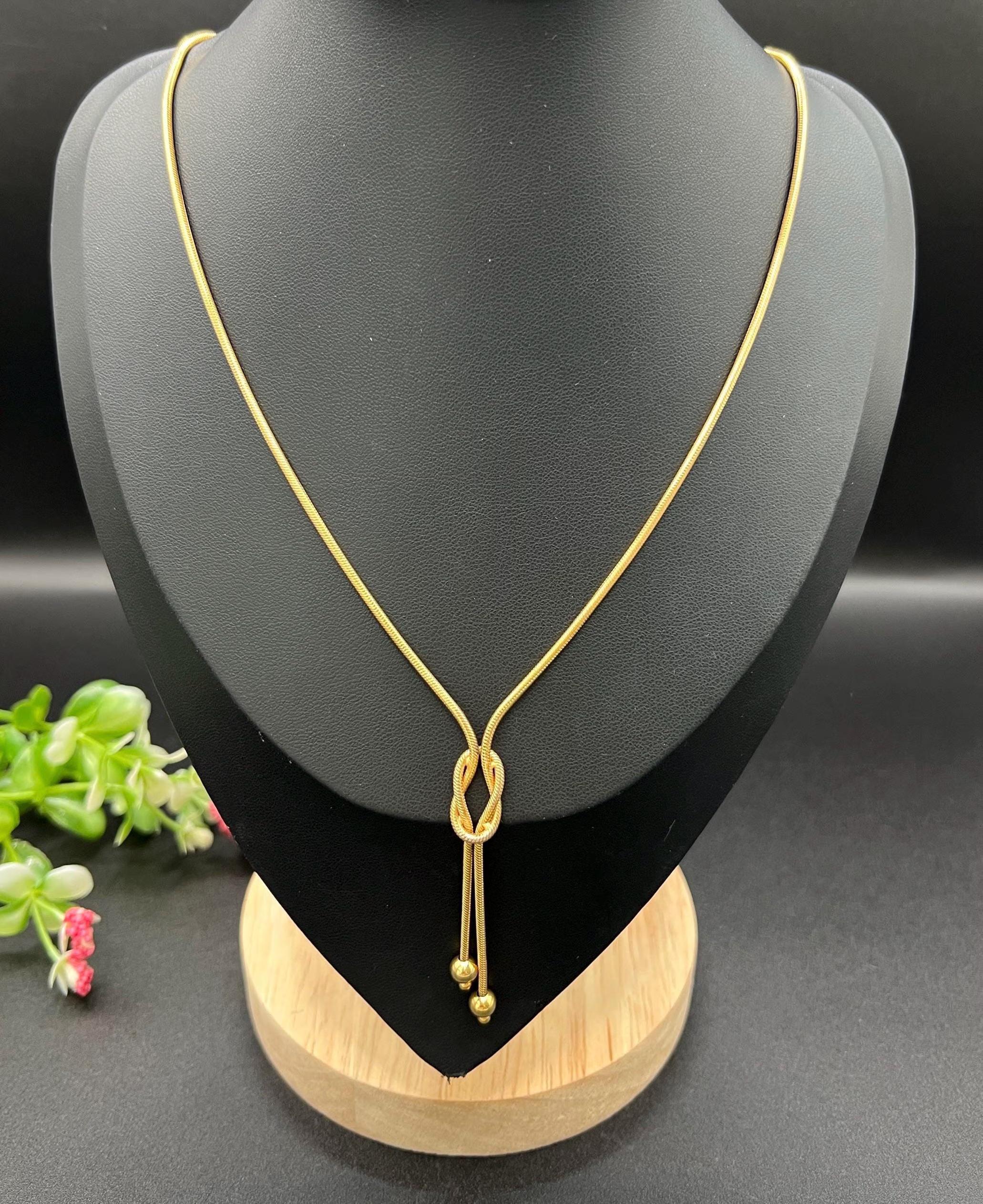 Cadena de nudo de enamorado de eslabones de serpiente de oro amarillo 9 ct de la década de 1990 con matasellos de Birmingham en Bueno estado para la venta en Brighton, GB