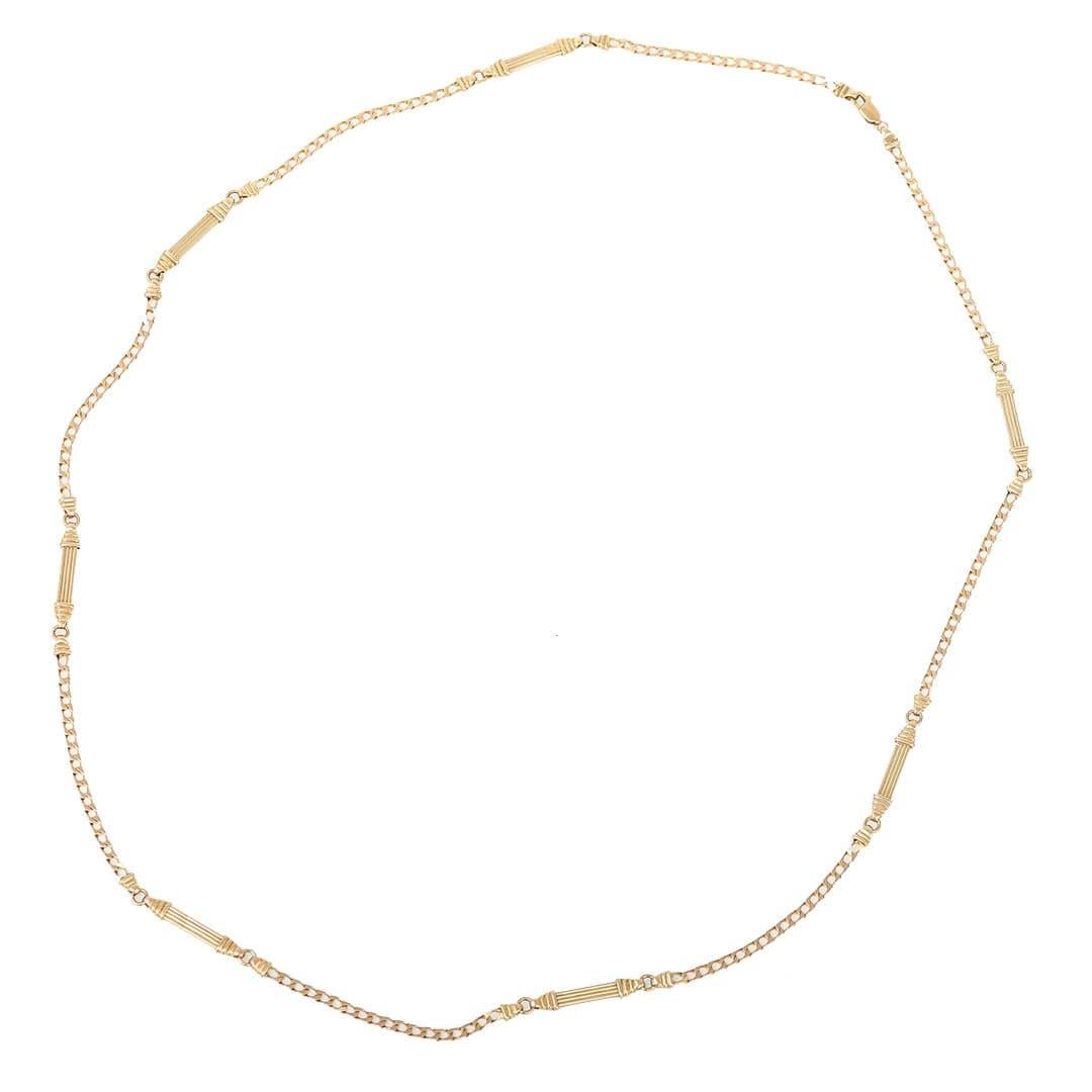 A stylish vintage 9ct yellow gold long, fancy link chain measuring 71cm (28”) and dating from around 1987. The chain is a great length allowing the possibility for it to be looped around twice to create stylish layered look alongside other pieces or
