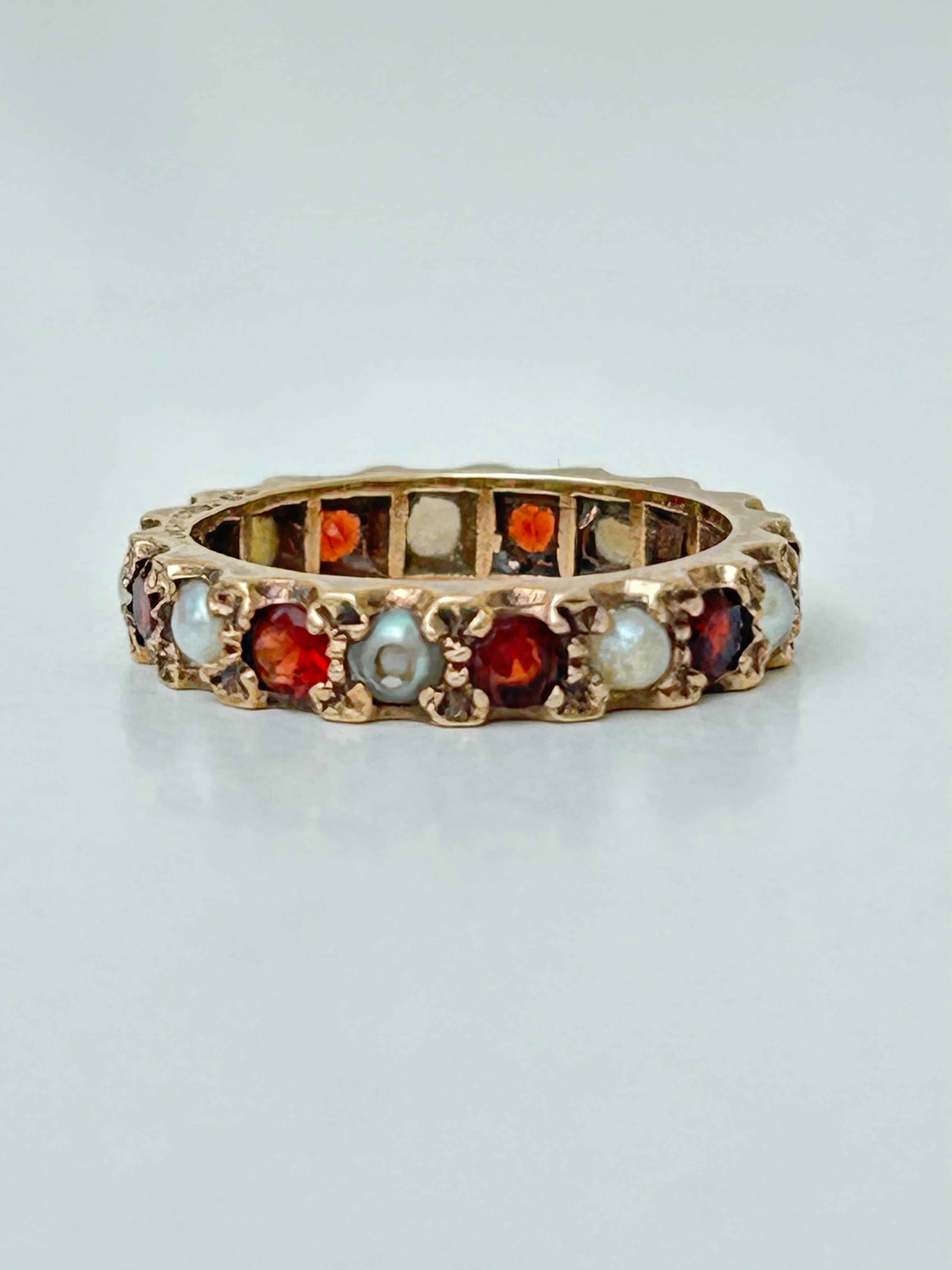 Artist Vintage 9 Carat Yellow Gold Garnet and Pearl Full Eternity Band Ring For Sale