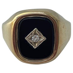 Siegelring aus 9 Karat Gelbgold mit Onyx und Diamant