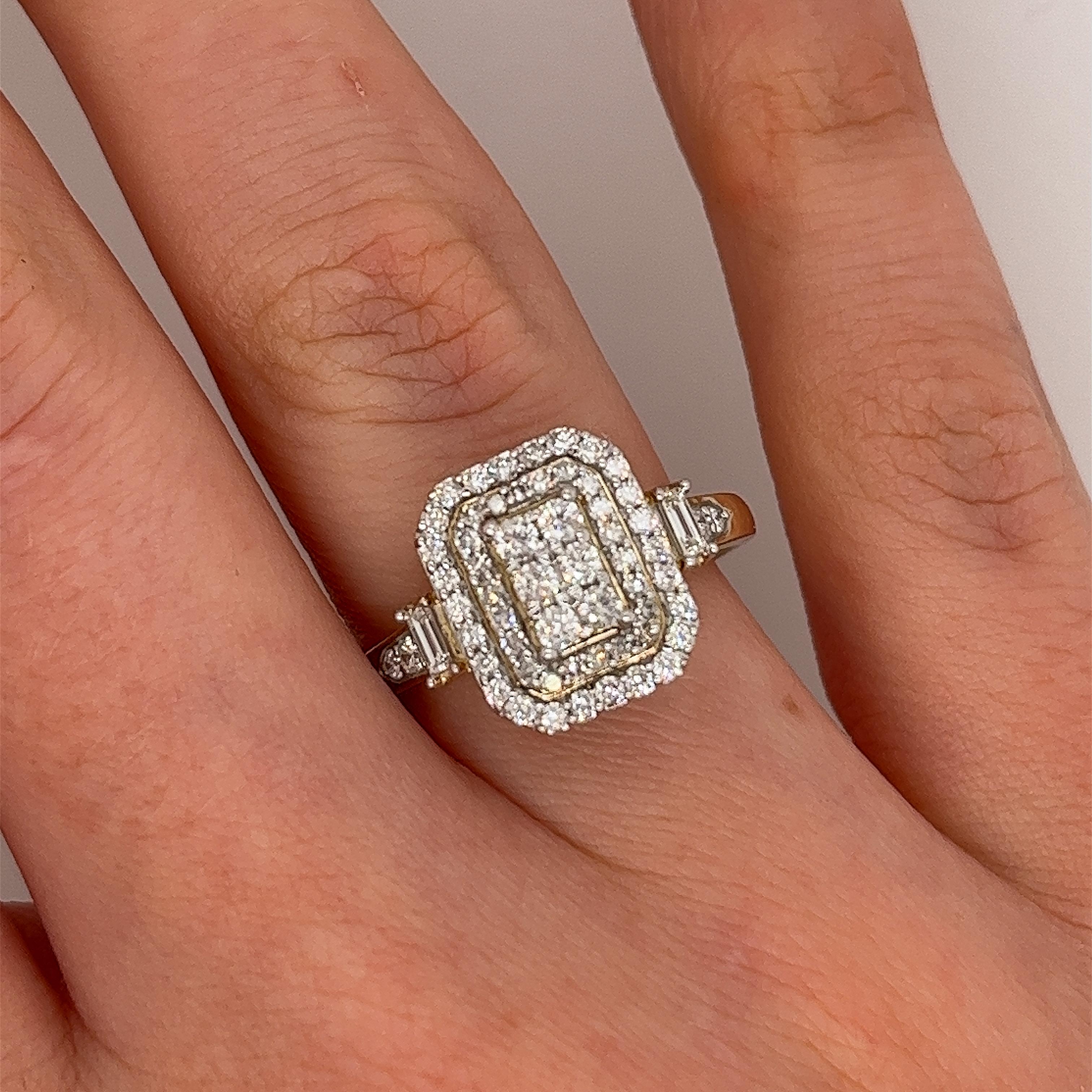 An elegant and unique vintage diamond cluster ring, 
set with 0.63ct H-I colour and SI1 clarity round old cut diamonds in a 9ct yellow & white gold setting.

Total Diamond Weight: 0.63ct
Diamond Colour: H-I
Diamond Clarity: SI1
Width of Band: