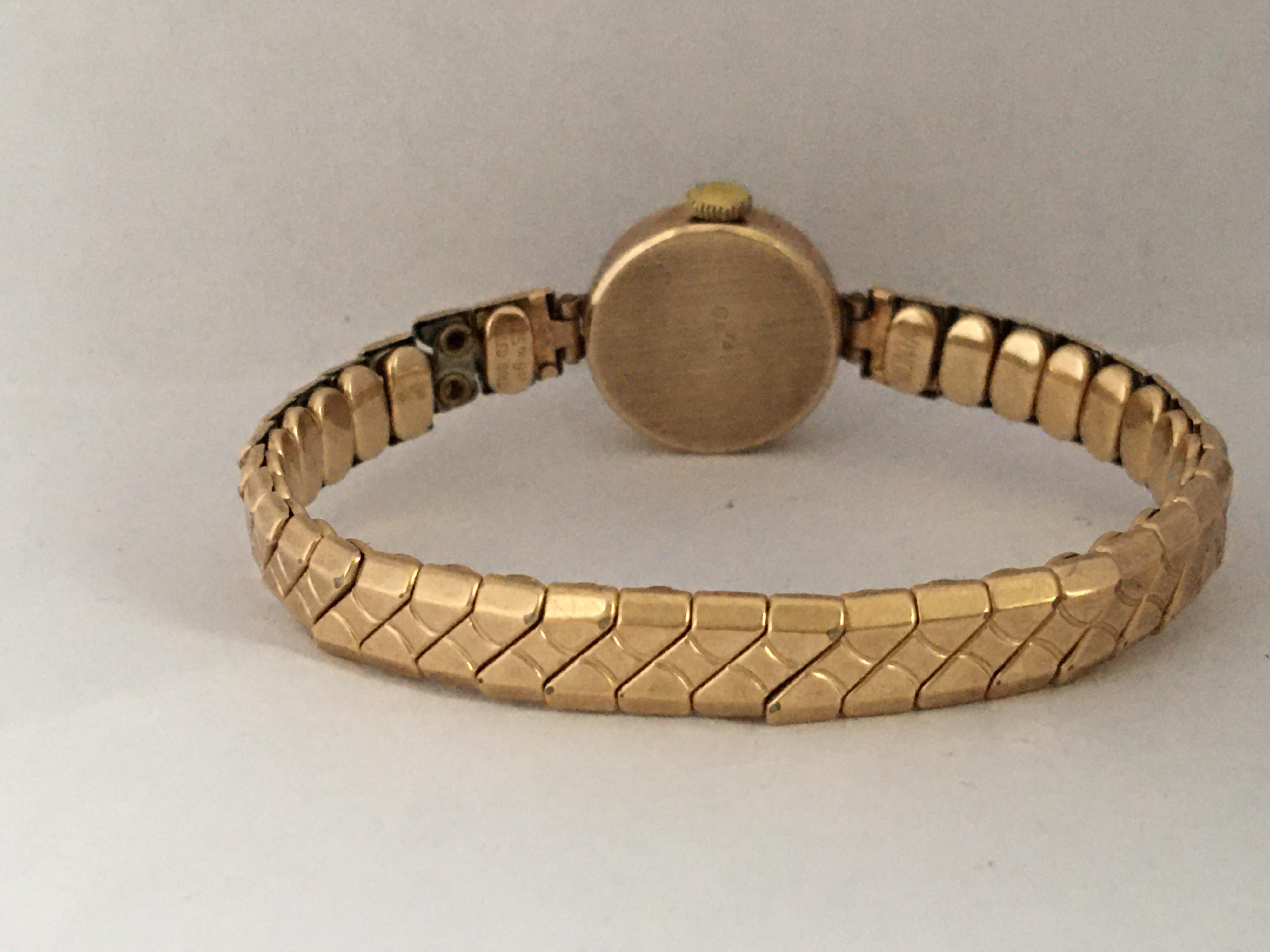 This beautiful vintage gold hand winding ladies watch is in good working condition and it is running well.