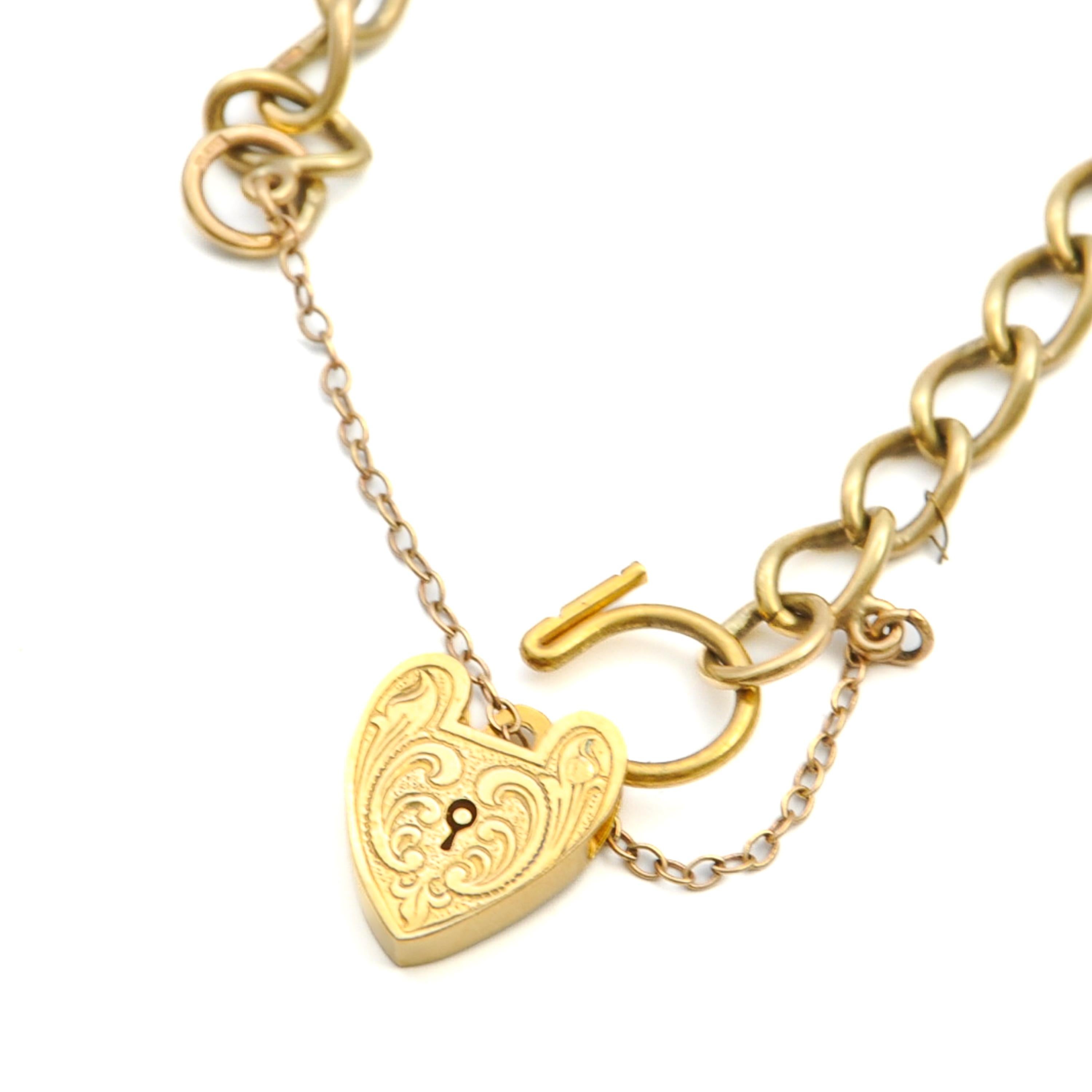 Vintage 9K Gold Heart Padlock Curb Chain Charms Bracelet en vente 3