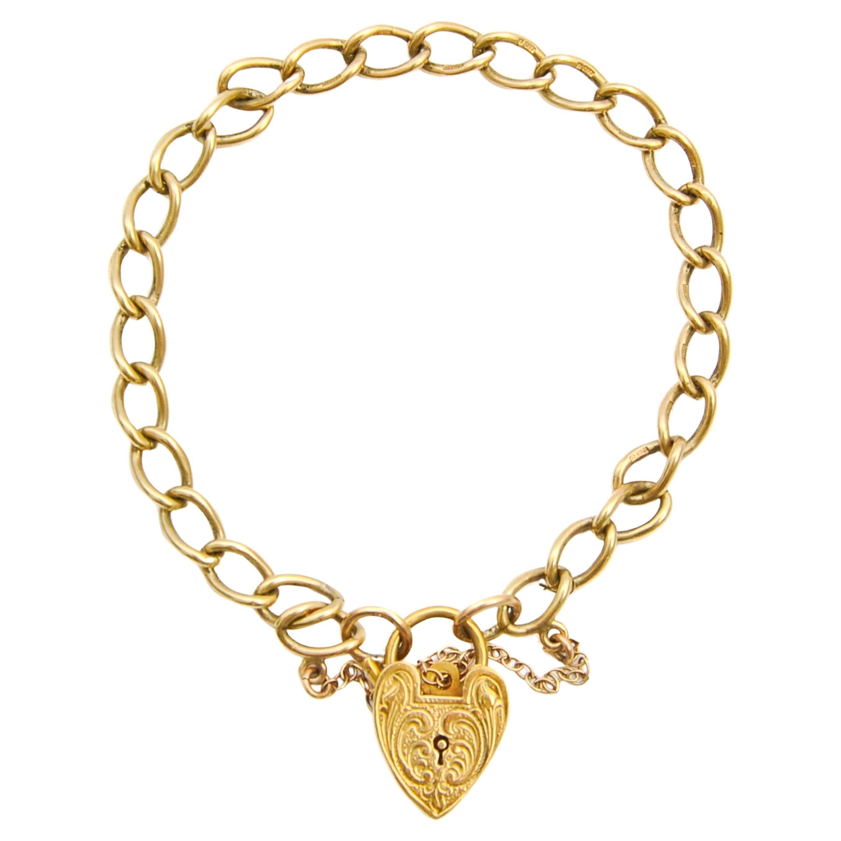 Vintage 9K Gold Heart Padlock Curb Chain Charms Bracelet en vente