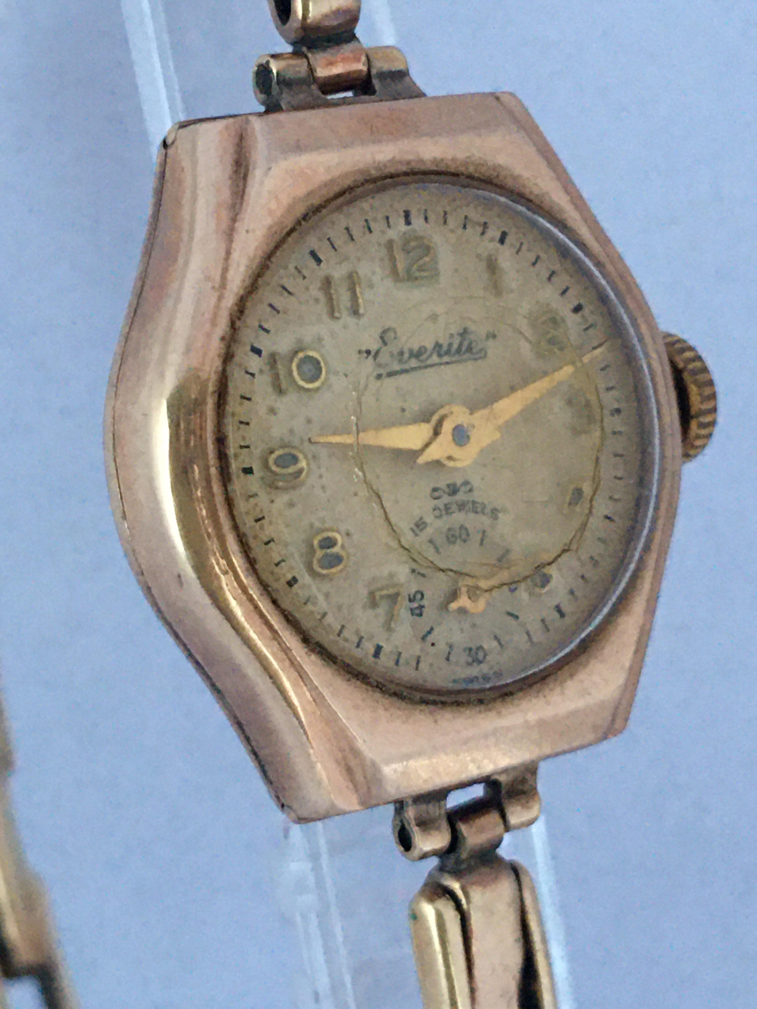 This beautiful vintage mechanical ladies gold watch is not working . Visible signs of ageing and wear with light marks  on the glass and on the watch case . Visible cracks on the glass as shown. Please study the images carefully as form part of the
