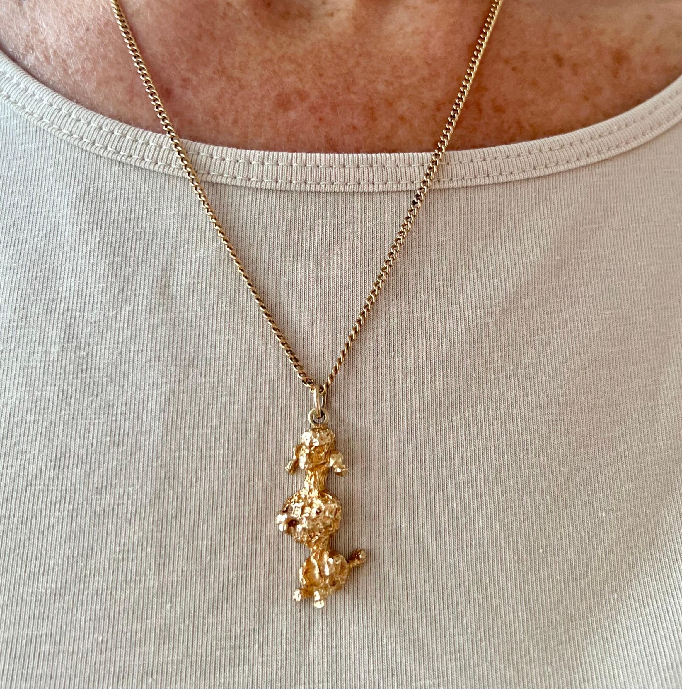 A lovely vintage 9 karat yellow gold poodle dog charm pendant. The always elegant poodle is beautifully detailed with a structured design which reminiscent the curly hair of the dog. 

The poodle dog spirit animal is a symbol of fun and happiness.