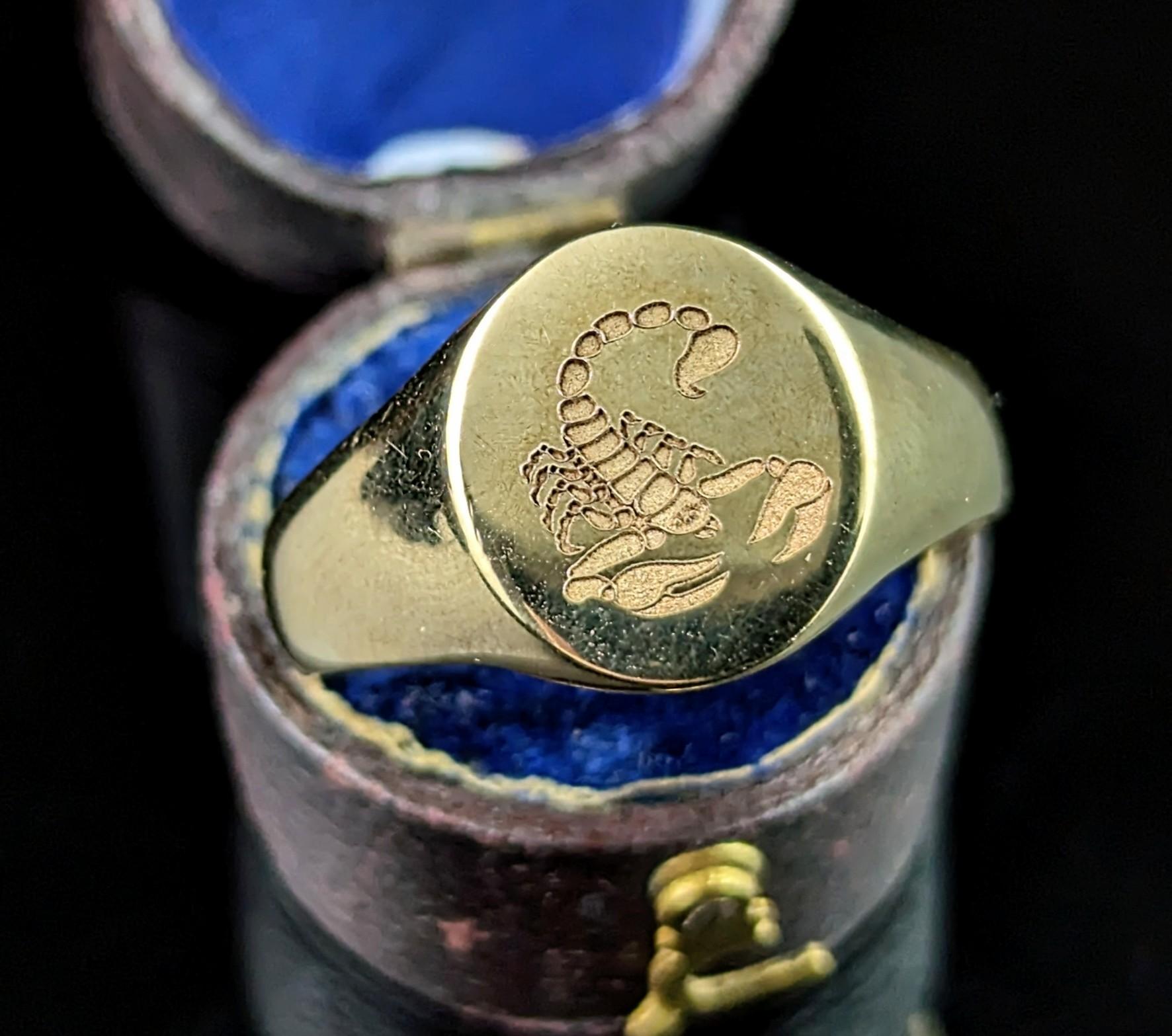 If you like a big, solid, chunky signet ring then this beauty is for you!

Lovely rich yellow gold, high polished with a smooth band and thick set shoulders, the face is an oval shape and has been engraved with a scorpion.

The engraving is very