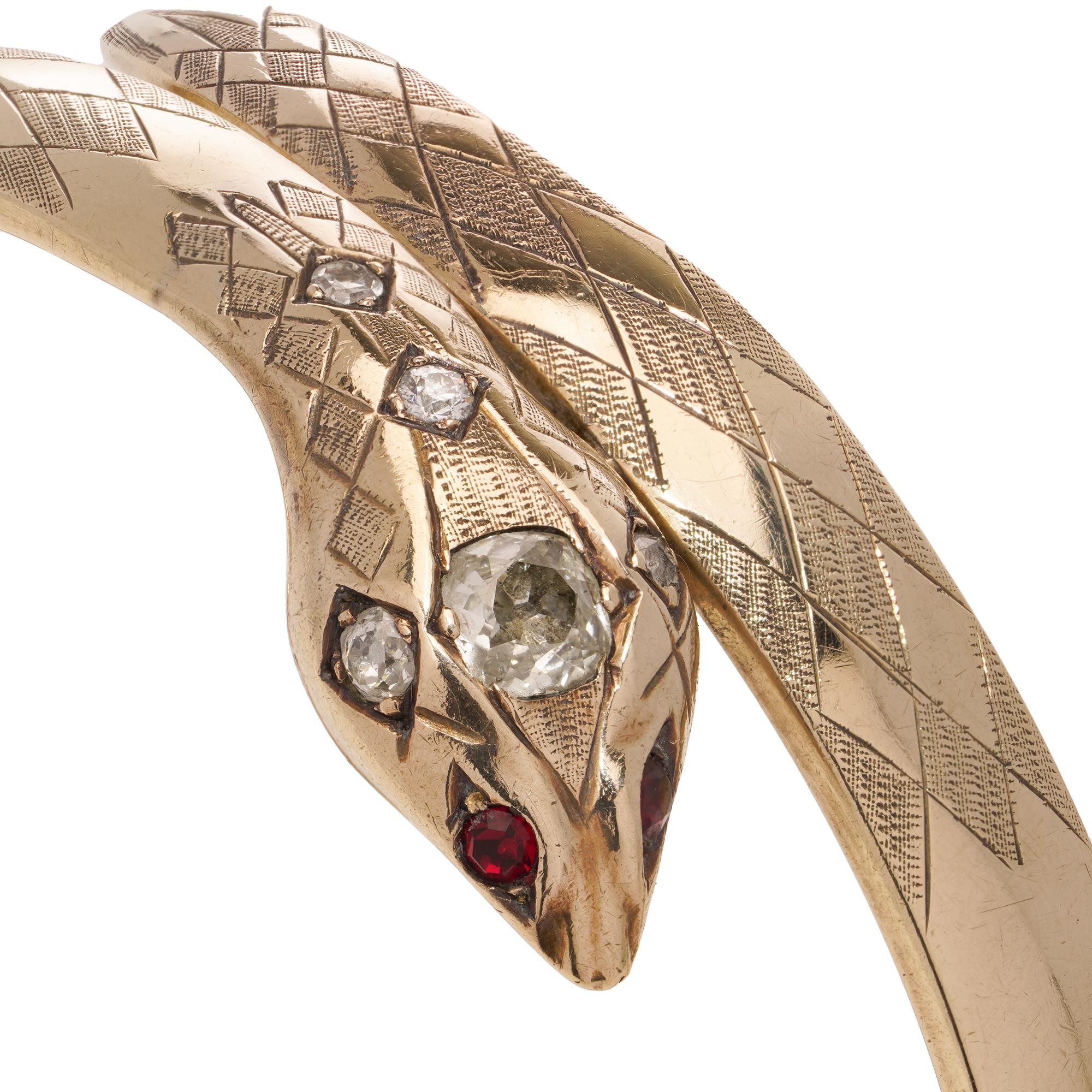 Women's Vintage 9kt gold serpent bangle with diamonds and rubies  For Sale