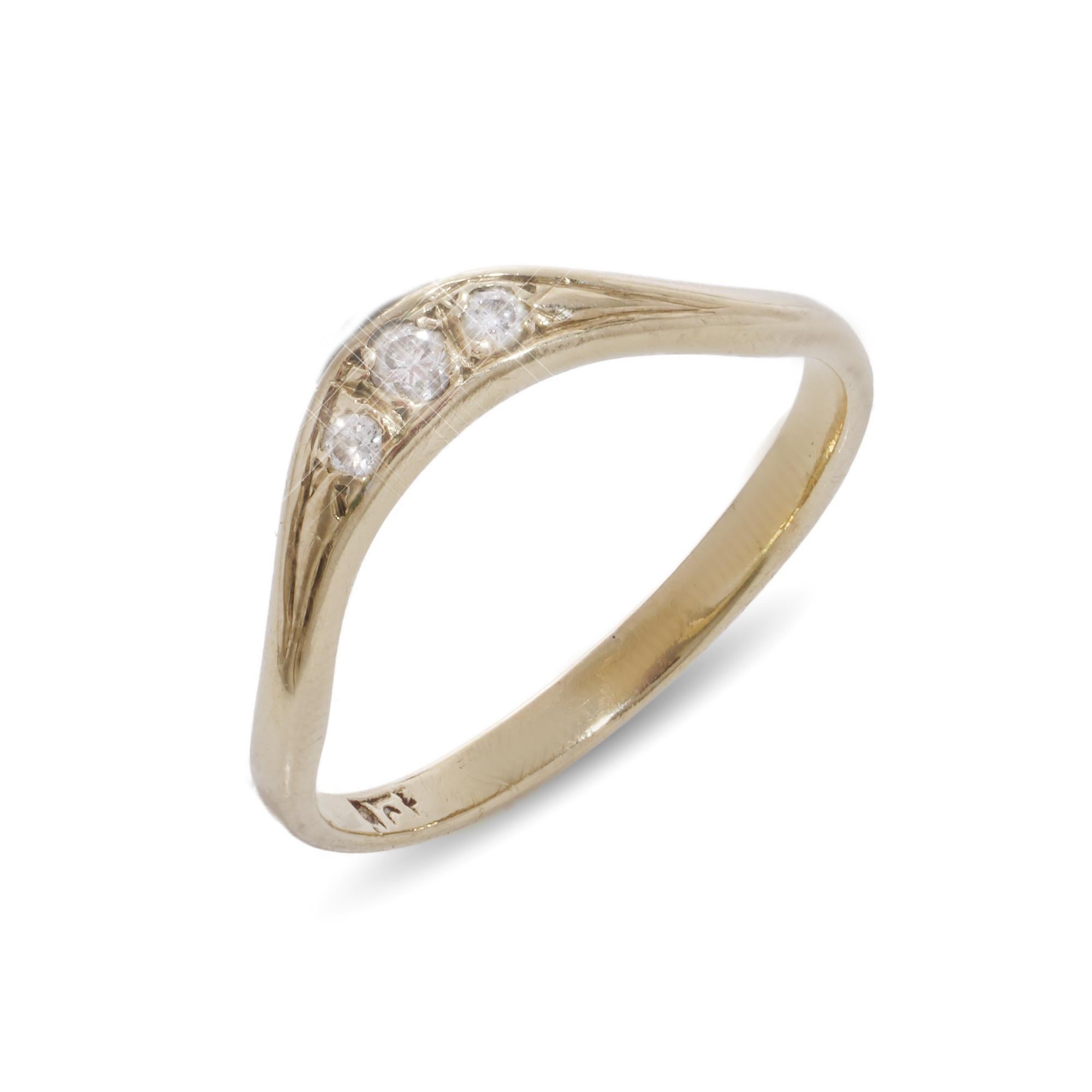 Vintage 9kt yellow gold three-stone diamond ring.
X-ray tested positive for 18kt gold.

Dimensions -
Finger Size (UK) = K (EU) = 52 (US) = 5.5
Weight: 1.00 gram

Diamond -
Cut: Round brilliant
Quantity of stones: 3
Carat weight: 0.07 carats in