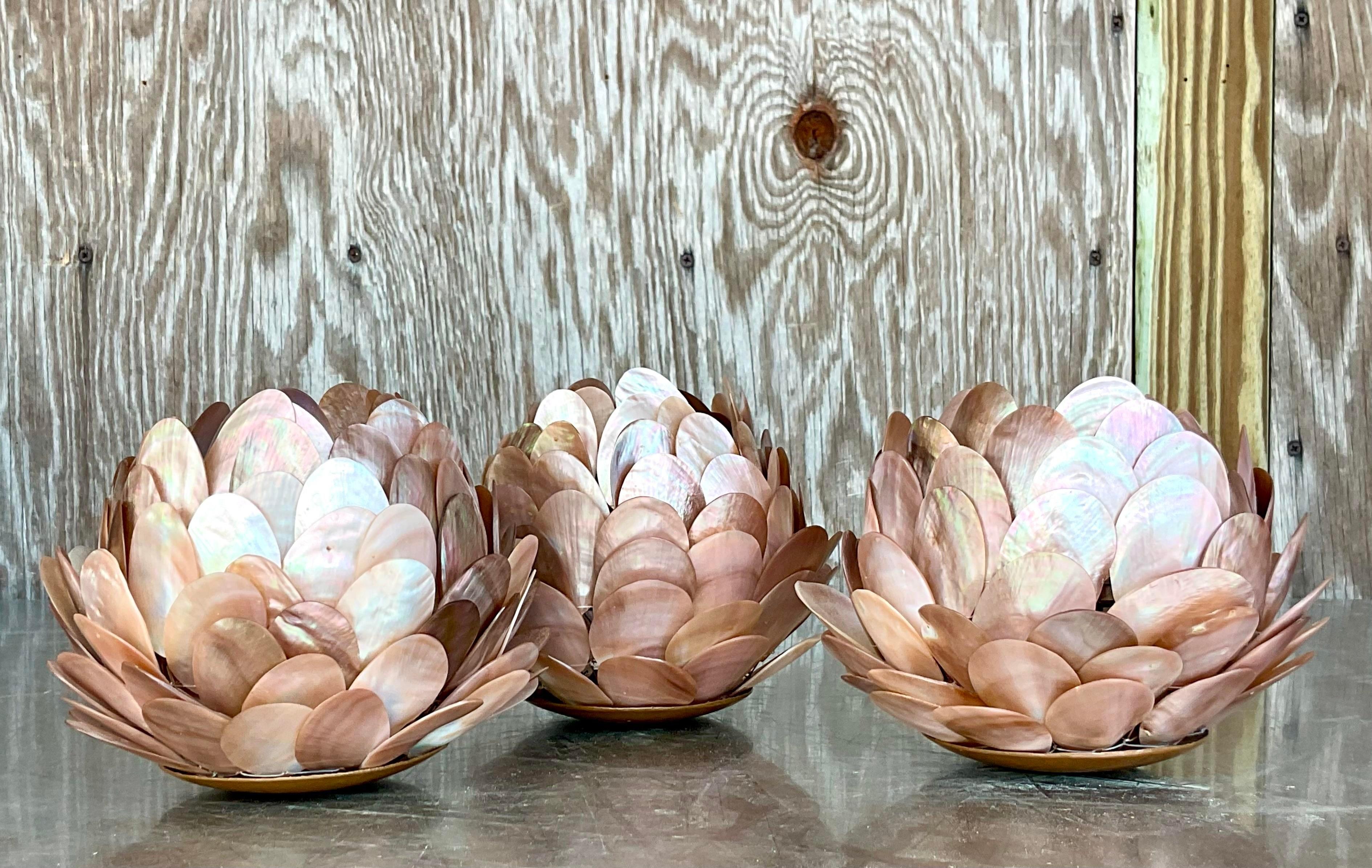 A fabulous set of three vintage candle holders. Beautiful Capiz Shell construction in a chic artichoke shape. The pretties are pale pink and mauve colors. Acquired from a Palm Beach estate. l