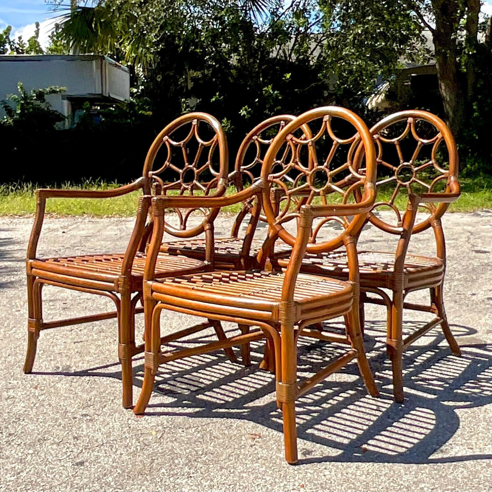 Vintage a Coastal Web Back Rattan Dining Chairs After McGuire - Set of 4 In Good Condition In west palm beach, FL