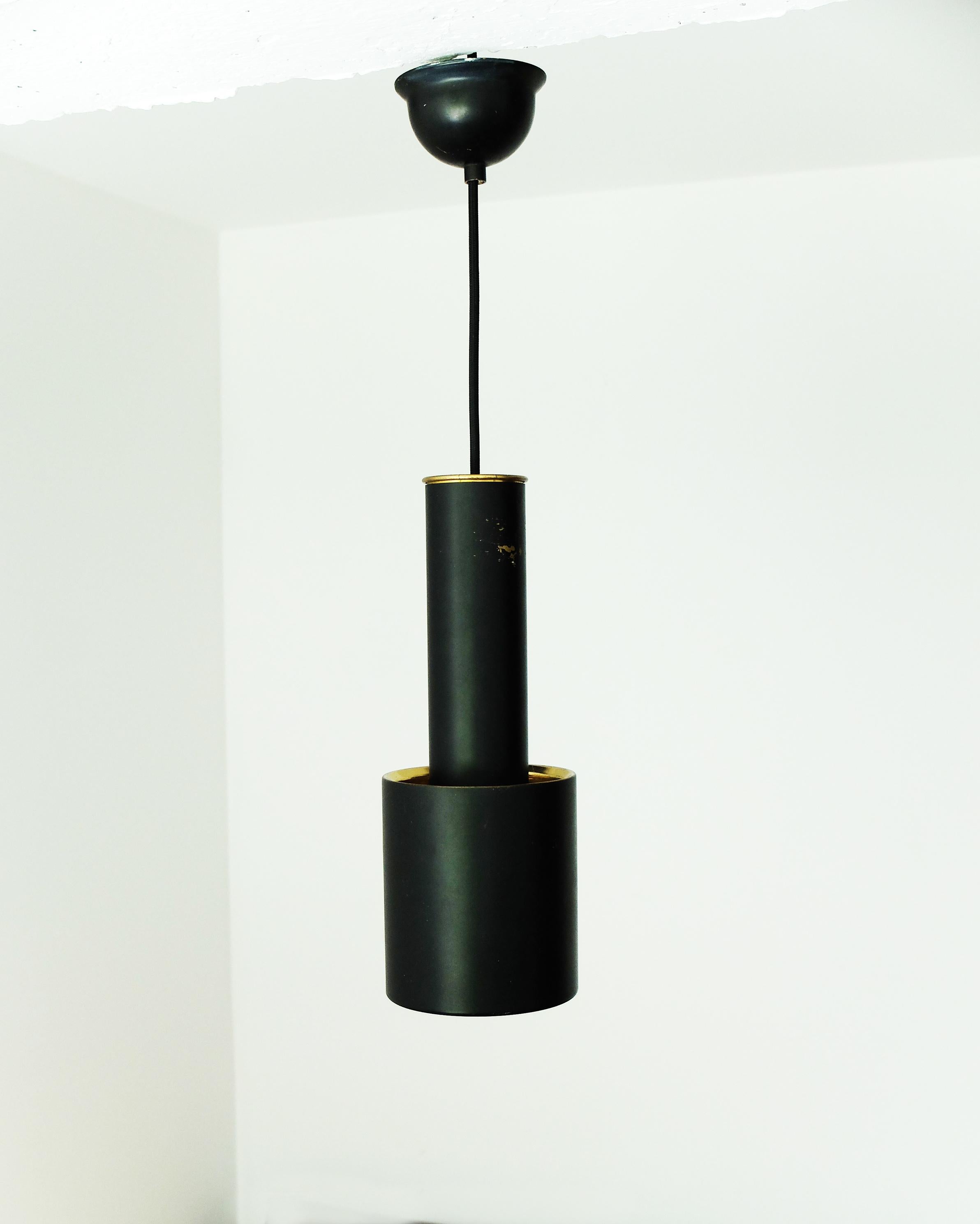 This elegant pendant light is nicknamed “Hand Grenade” because of its distinctive shape. 

This vintage lamp has been produced by Louis Poulsen, Denmark in the 1950s or 1960s.

The pendant Light A110 provides an exceptional warm-toned light due