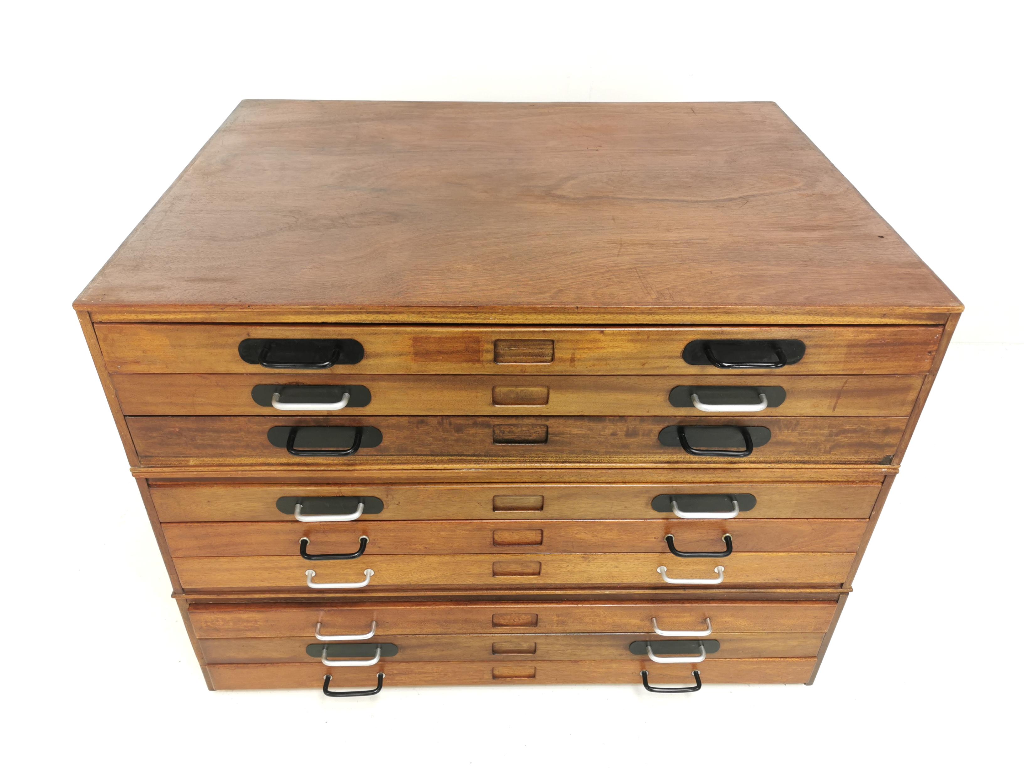 Three-tier oak plan chest of drawers
Plan chest by Abbess who made high-quality office furniture.
The 9 generous drawers split into three units to enable you to move around comfortably. 
Slots for nameplates and metal handles. Drawers all slide