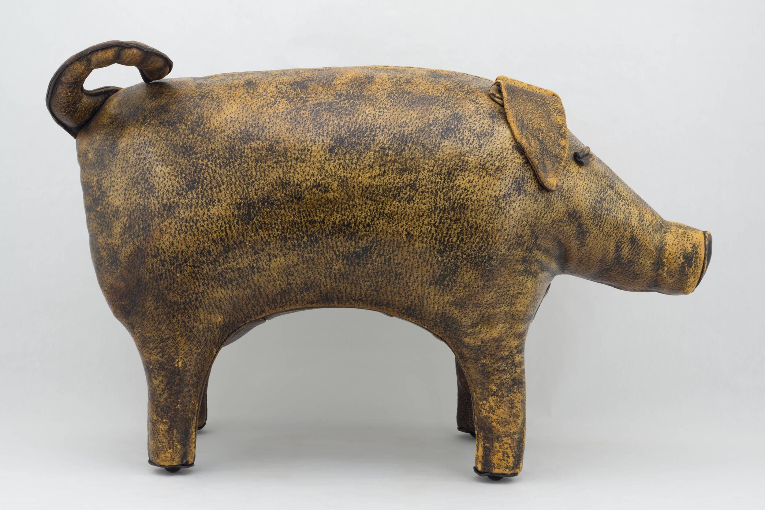 A hand-stitched and fabricated leather footrest pig, in a brown rich supple finish
showing the aged leather its texture. Hand-stitched and made by the original designer, Dimitri Omersa. Excellent condition
Measure: 16 ½” x 24” 10 ½’
English,
