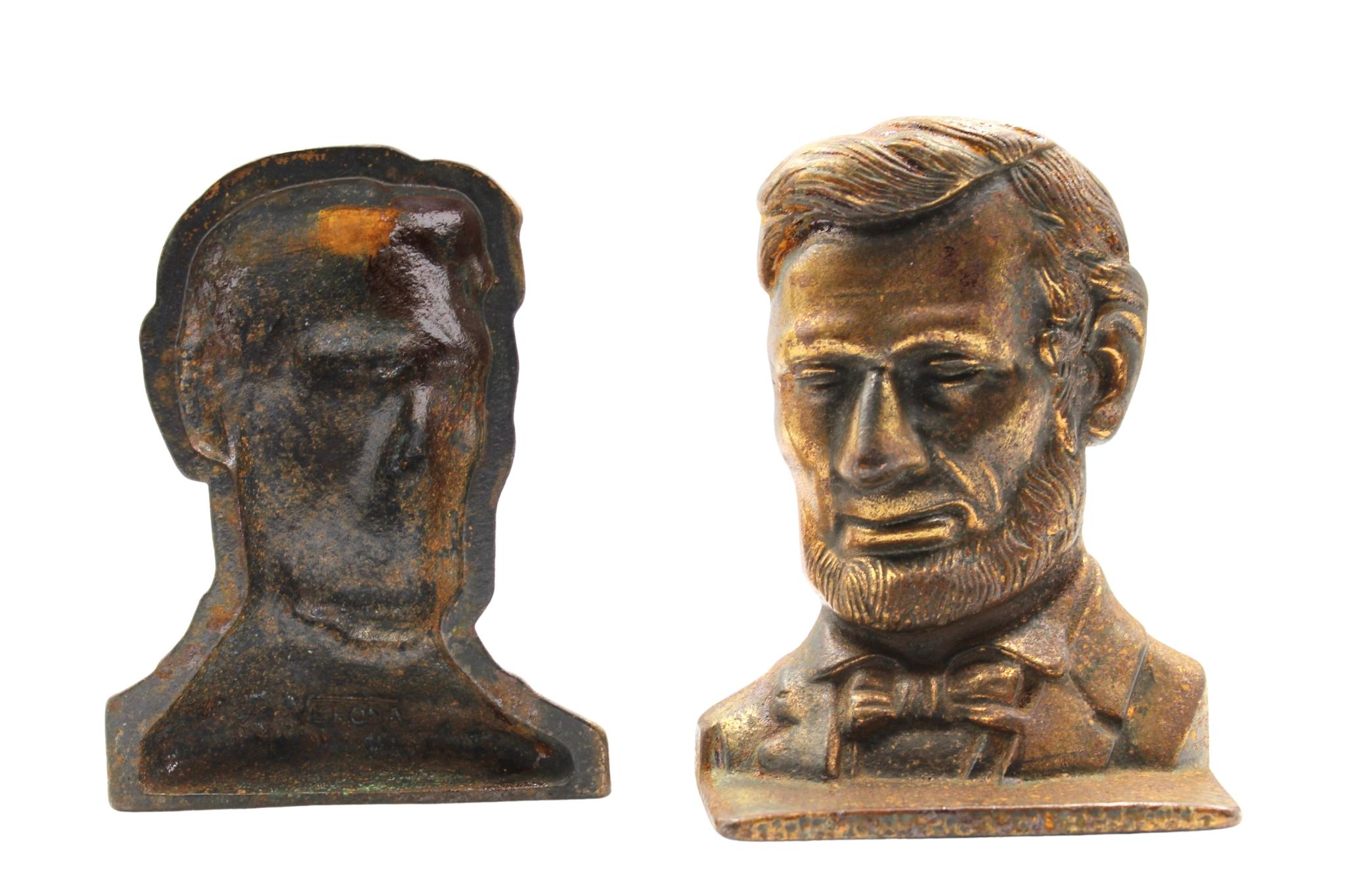 Offered is a pair of vintage Abraham Lincoln bust bookends. The pair feature the likeness of Abraham Lincoln with detailed facial features and formal attire. The bookends were made by Verona in the mid 20th century. 
The Lincoln bust is modeled