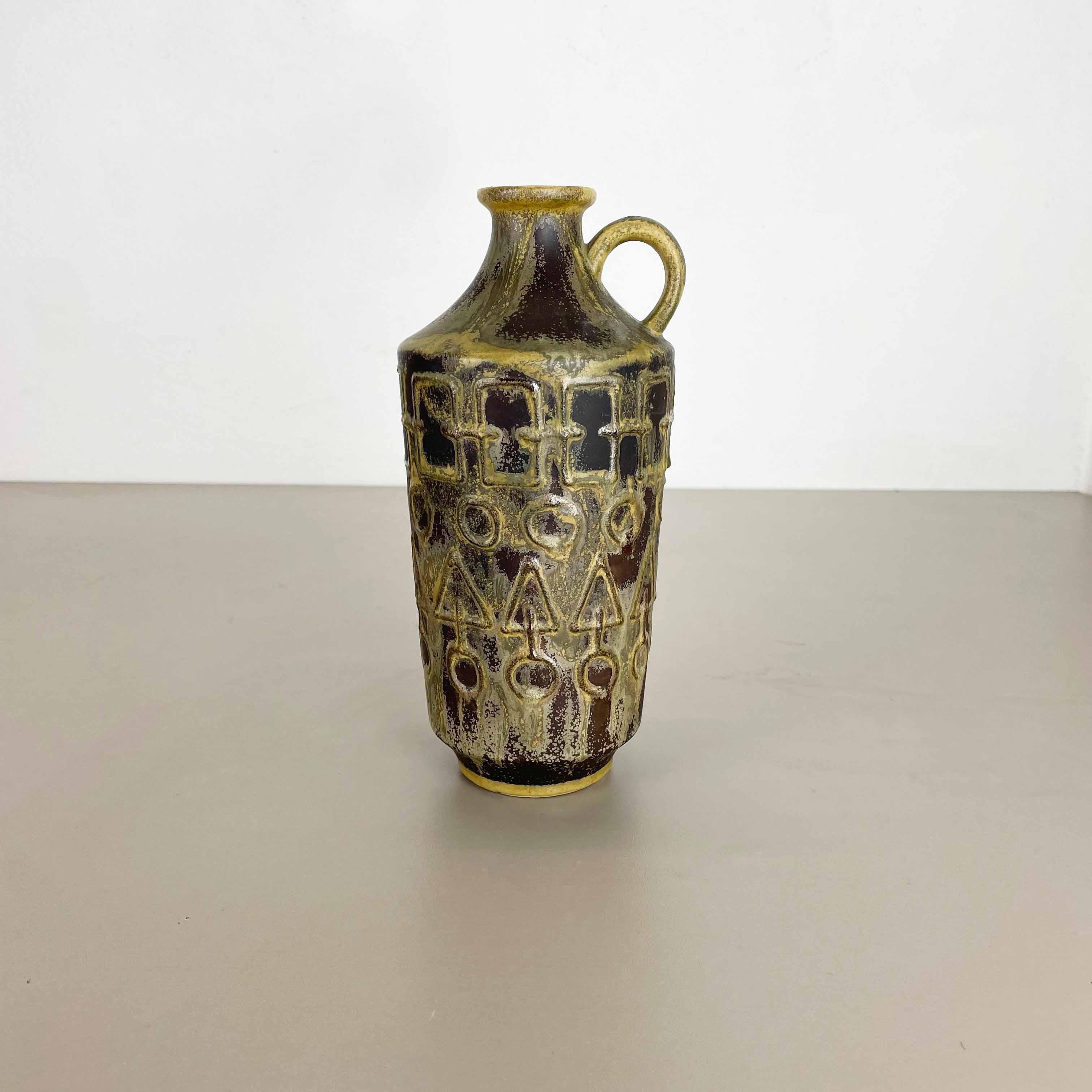 Article:

Pottery ceramic vase


Producer:

Simon Peter Gerz, Germany


Decade:

1960s



Description:

Original vintage 1960s pottery ceramic vase in Germany. High quality German production with a nice abstract coloration. The