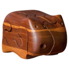 Sculpture-puzzle vintage abstraite représentant un hippopotame, réalisée à la main en bois massif par Deborah Bump