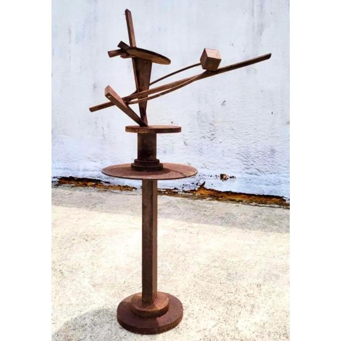 Vintage Boho Abstract steel sculpture. Made by the artist Joel Graessner. Intriguing welded steel shapes in a monumental size. All over rusty patina from time. Acquired from a Palm Beach.