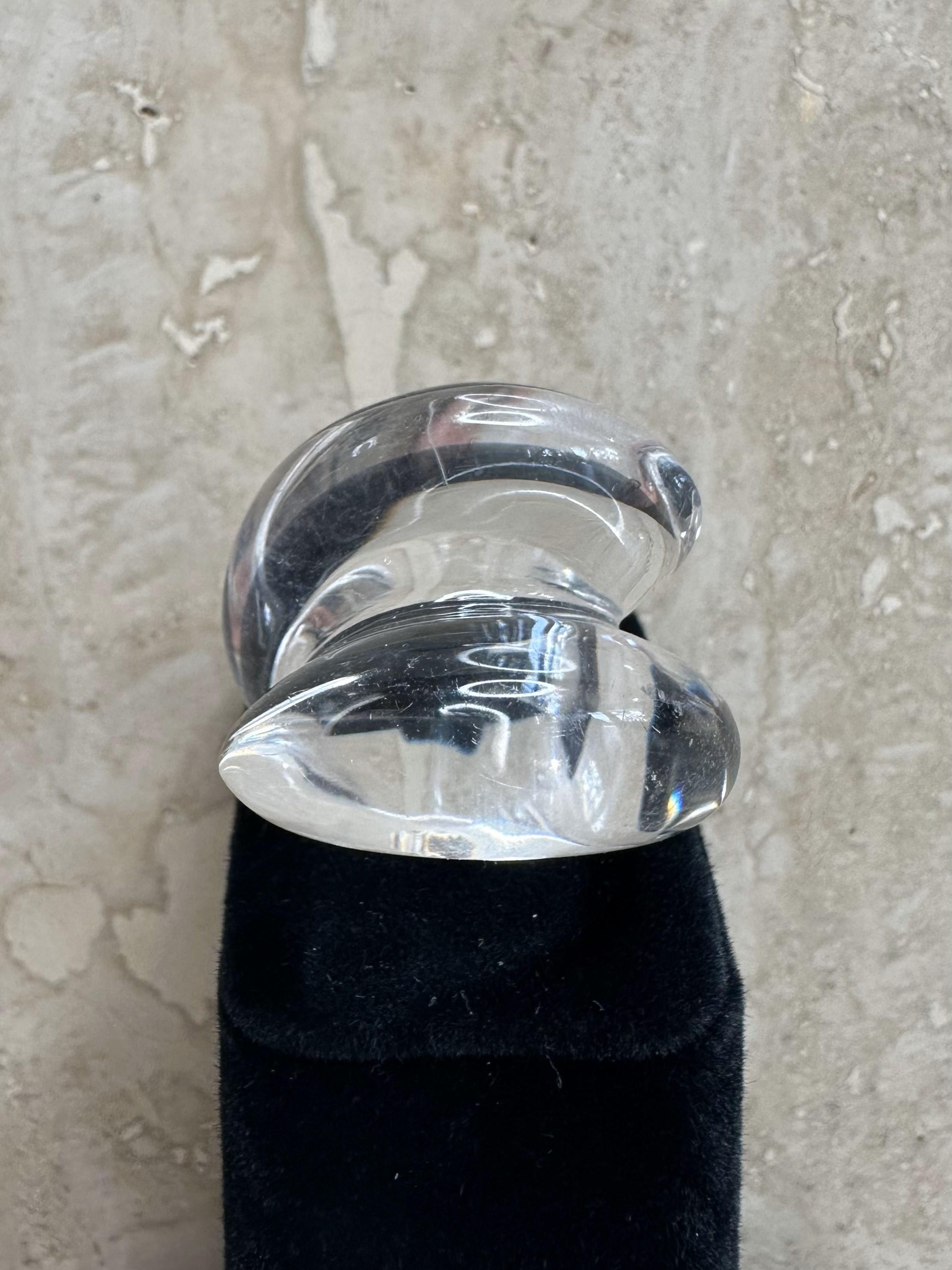 A Vintage Abstract Lucite Ring is a unique and striking piece of jewelry, often celebrated for its bold, artistic design and vibrant use of color and form. Lucite, a type of acrylic resin, was widely used in mid-20th century fashion and is highly