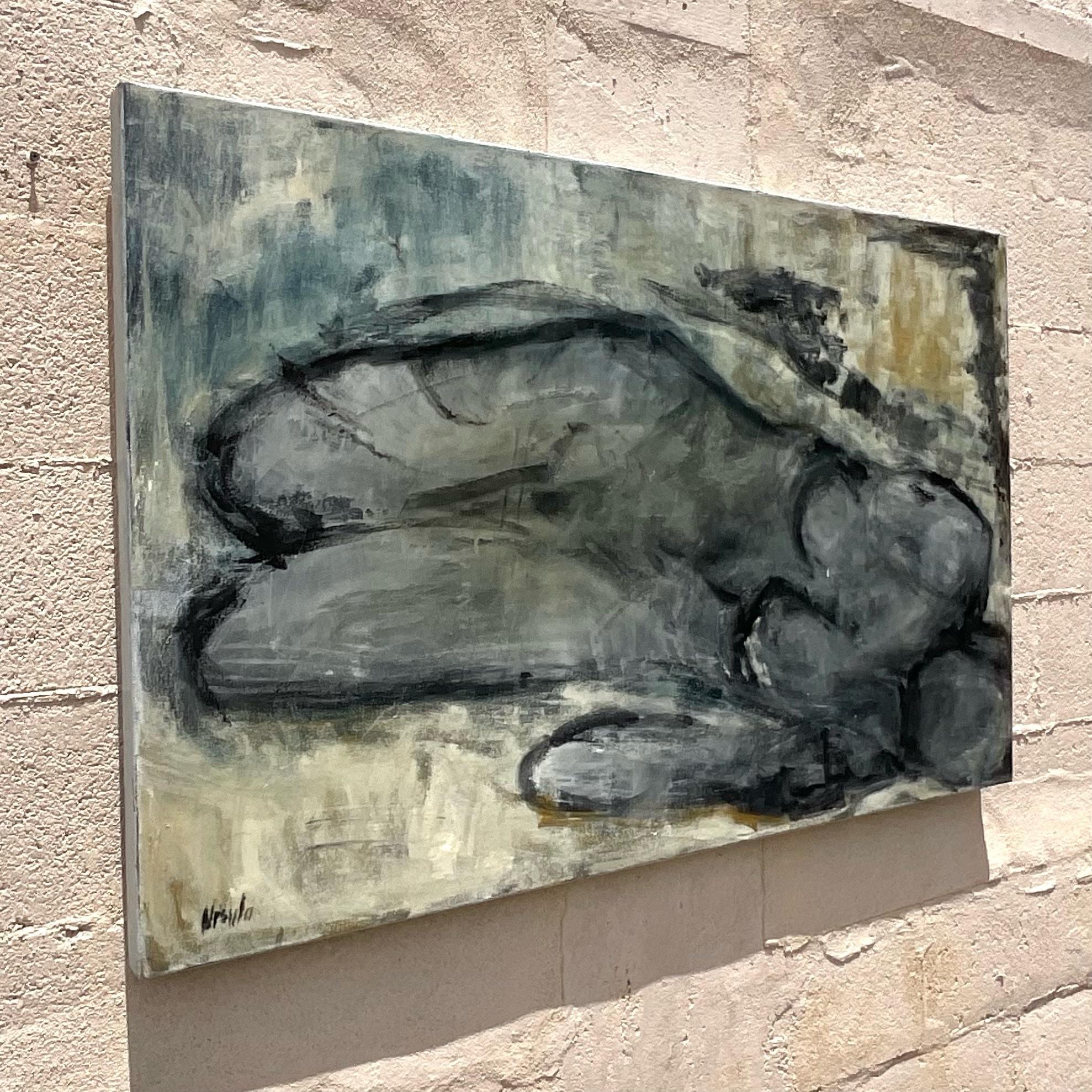 Vintage abstract of a recumbent woman on canvas. This emotional piece is beautiful in it’s simplicity. The abstract outline of woman amongst a sea of grays and blues. She is sure to be the topic of conversation wherever she resides. The piece also