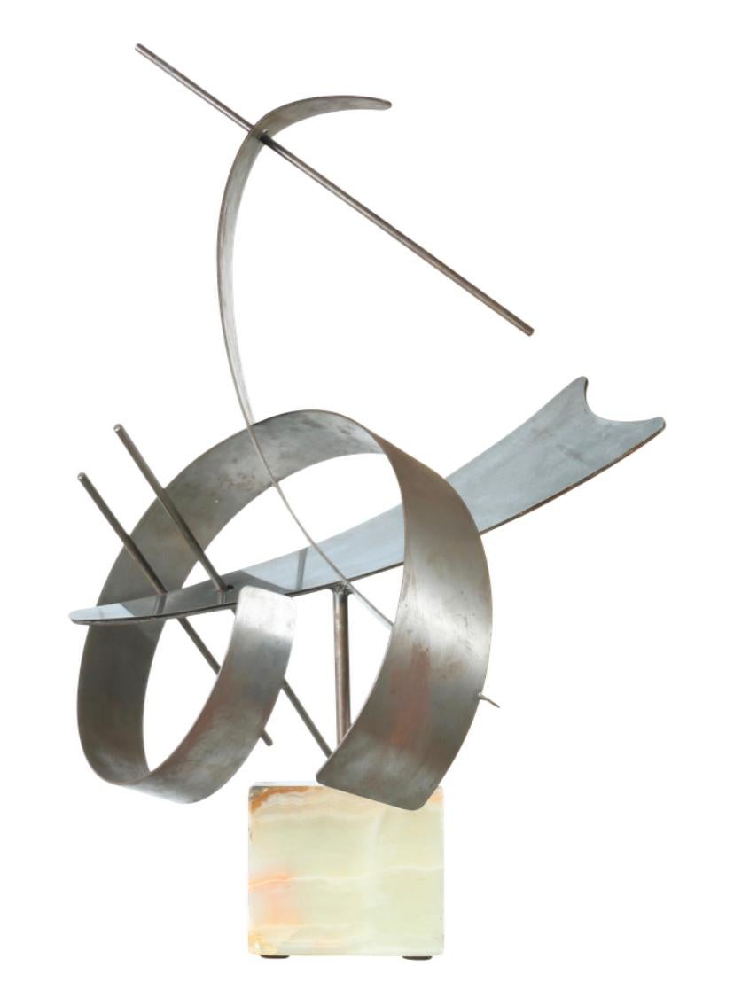 Beautiful Mid-Century Modern stainless steel abstract sculpture sitting on a squared marble base. 
Super well kept and sturdy. Top stainless steel sculpture can be removed from the base.. No chips or cracks on heavy marble base.. Great abstract