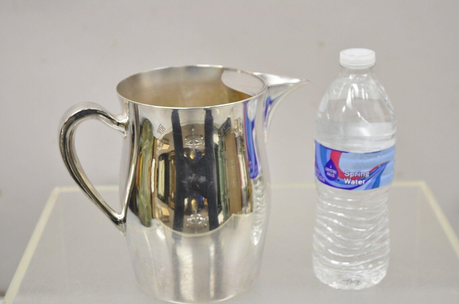 Vintage Academy Silver on Copper Modernist Bulbous Water Pitcher. Circa Mid to Late 20th Century. Measurements:  7