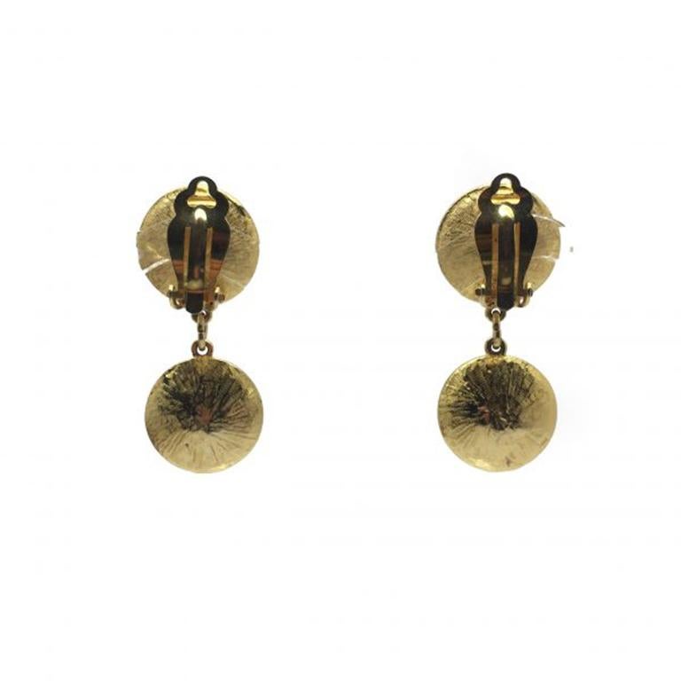 The most stunning, vibrant pair of vintage crystal 1980s Rivoli Acid Yellow Drop Earrings. Featuring acid yellow rivoli stones - a type of foiled glass stone with a pointed top and facets all round and manufactured by Swarovski. Set in high quality