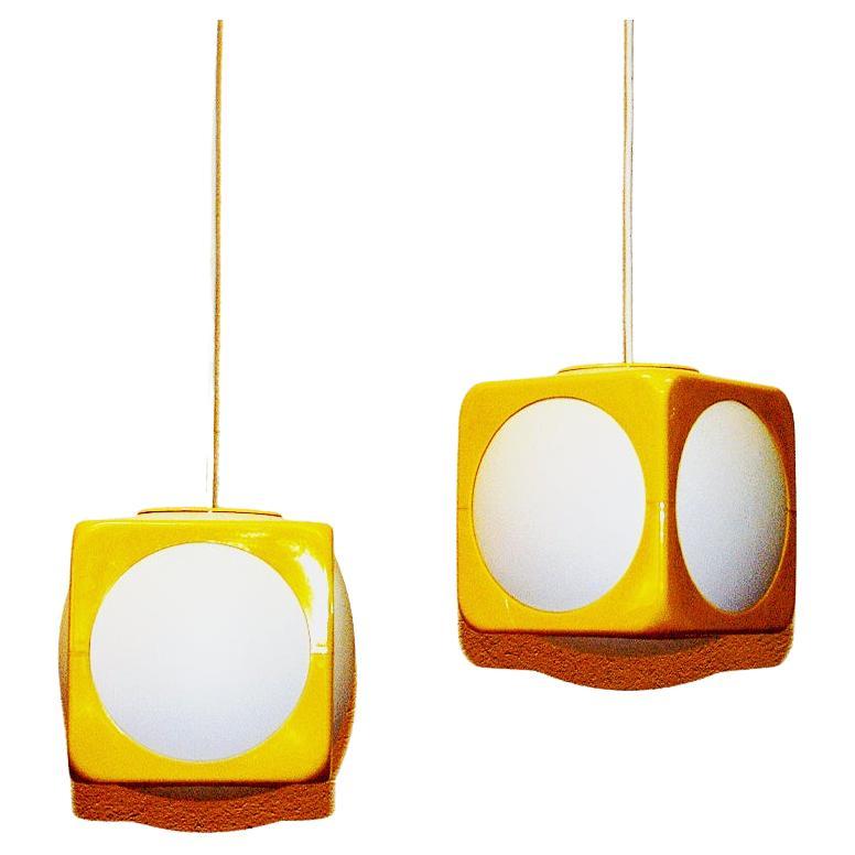 Great look, lovely and colorful Space Age pair of acrylic pendant lights `Kuben` by Schiöler/Hoyrup for IKEA, Sweden 1970s. Looks great in bright colors of white and yellow. Perfect in your retro livingroom, kitchen or as window pendants. Beautiful