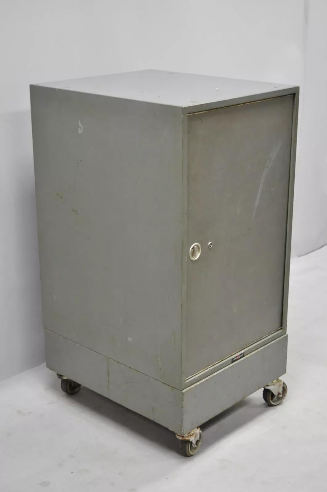 Vintage Addressograph Industrial Steel Metal 30 Drawer Garage Parts Cabinet. Item features 30 drawers, steel metal construction, rubber wheels, top lifts off base, quality American craftsmanship, approximately 225 lbs, drawers approximately 2