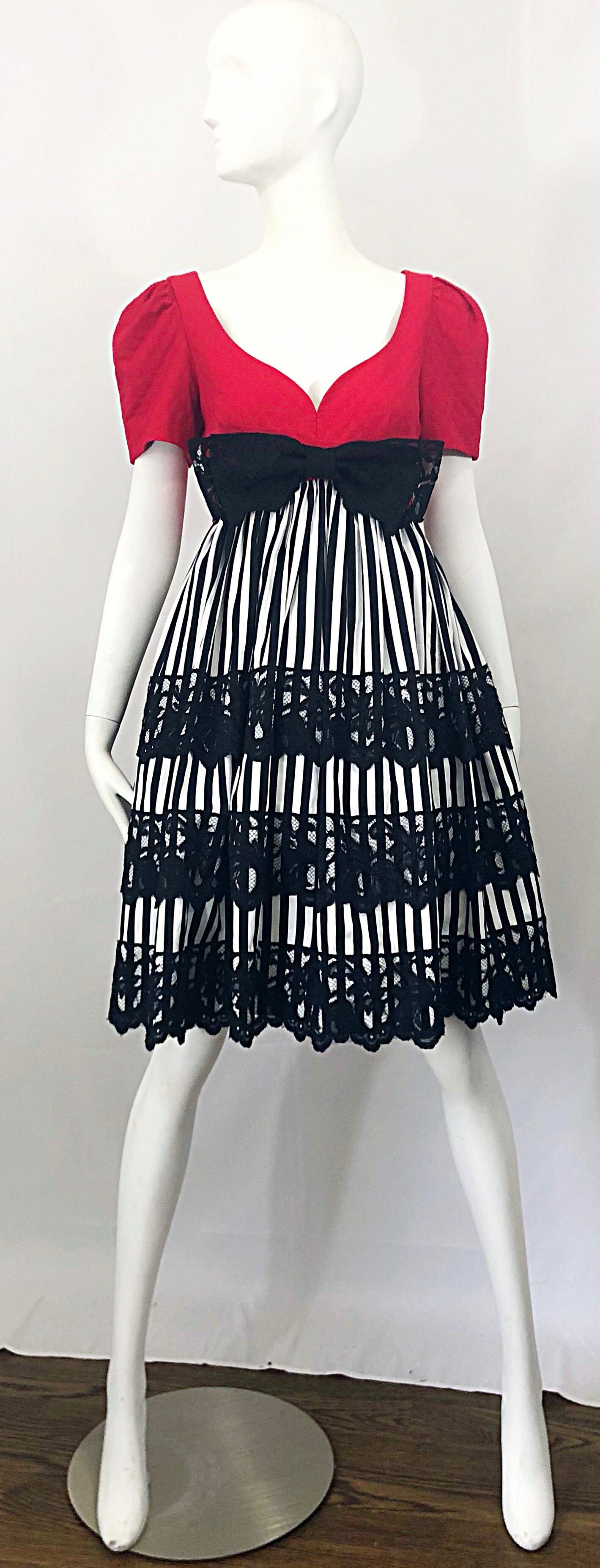 Insanely chic vintage 1980s / 80s ADELE SIMPSON red, black and white fit n' flare cocktail dress! Features a fitted red cotton pique bodice with a sweetheart neckline. Empire waist with a black and white striped silk skirt. Three black lace panels