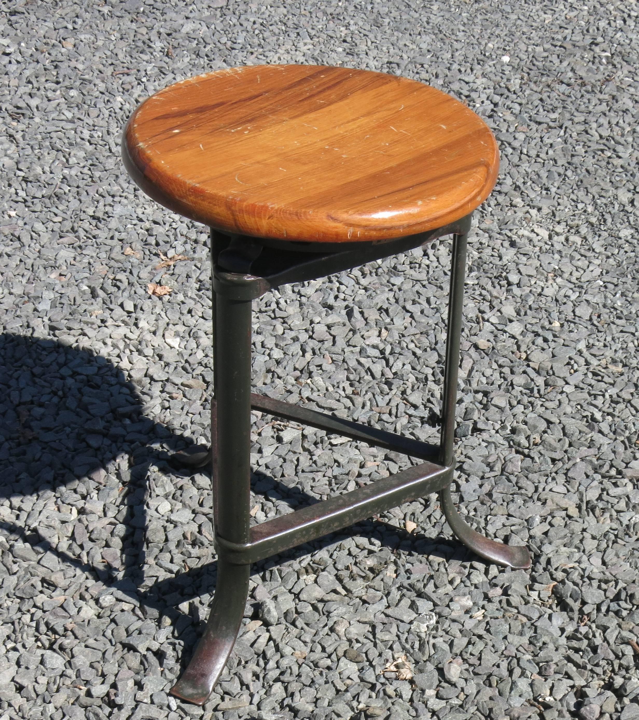 Great looking industrial stool can raise from 20