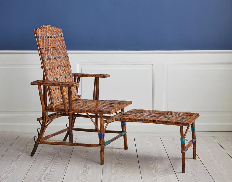 France, 1930s

Adjustable rattan armchair and footrest with blue woven details.

Measures: H 100 x W 71 x D 128 cm.
  