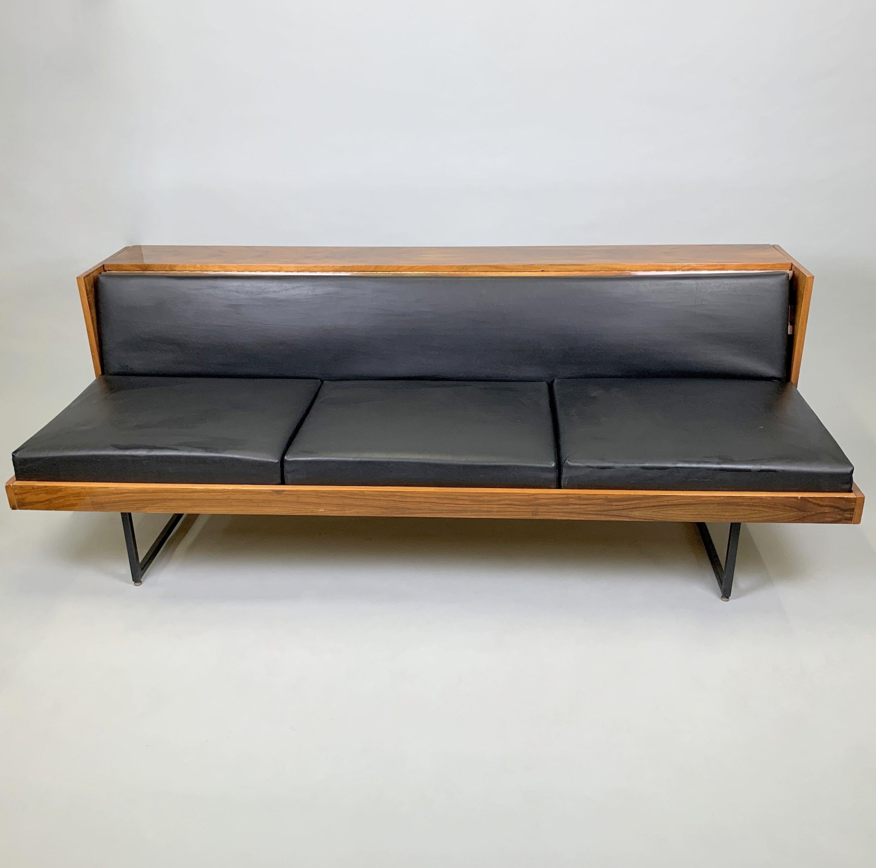 Vintage adjustable sofa made of wood, metal and leatherette. It was a part of high class furniture called 'Belmondo', made in Czechoslovakia by Novy Domov in Spiska Nova Ves (marked). In a good vintage with some signs of use (see photo).