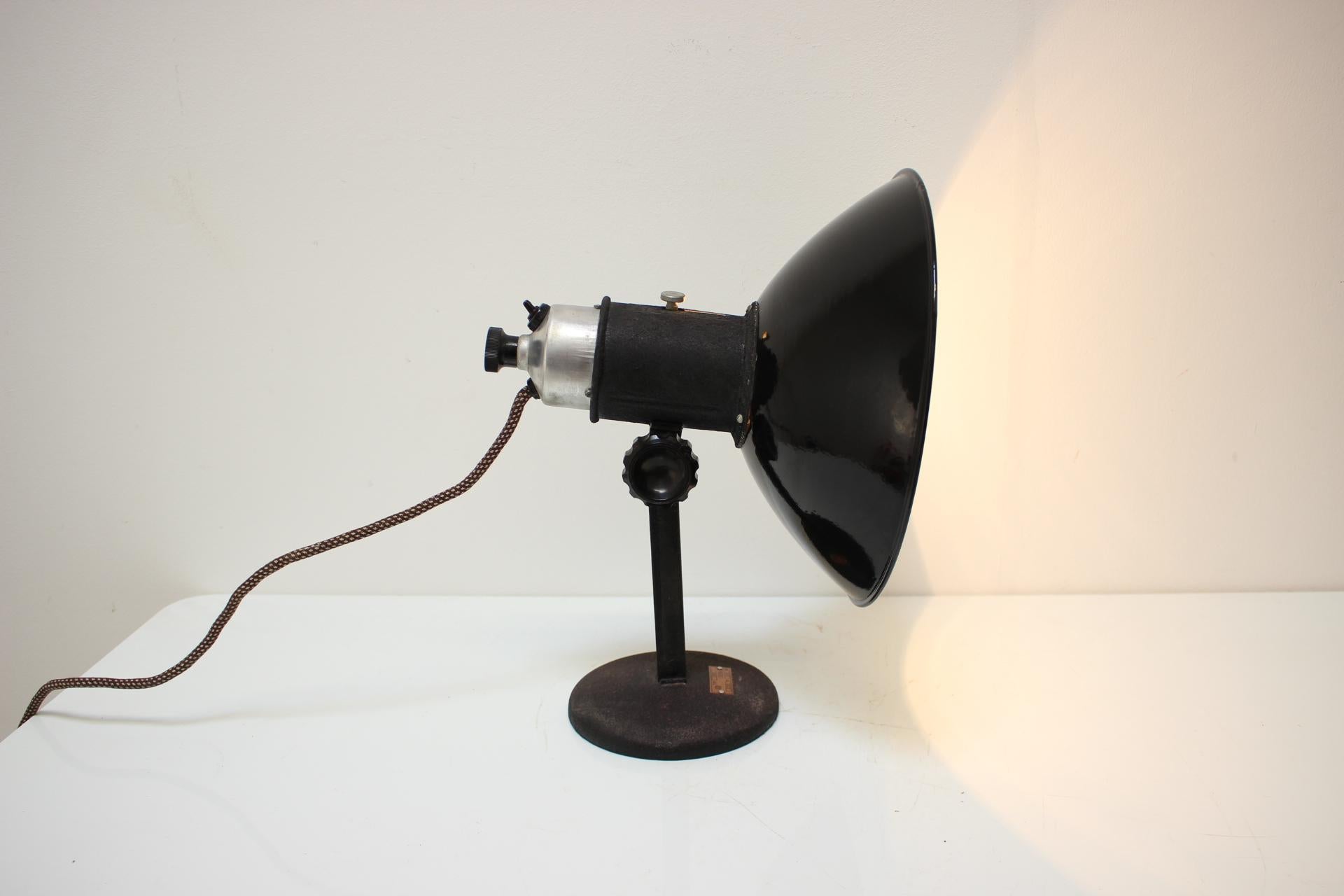 Mid-century adjustable table lamp, made in the former Czechoslovakia in the 1950's.
Made of metal.
Fully functional, repolished, cleaned, in original condition, with a few signs of use (shown in the pictures posted).