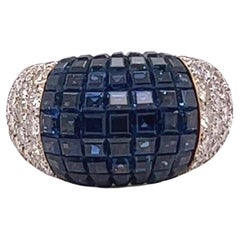 Vintage Adler Sapphire Diamond 18 Karat Gold Invisible Setting Bombé Ring