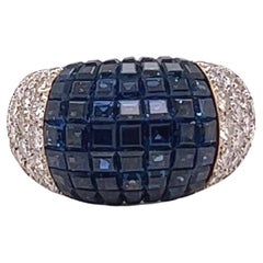 Vintage Adler Sapphire Diamond 18 Karat Gold Invisible Setting Bombé Ring