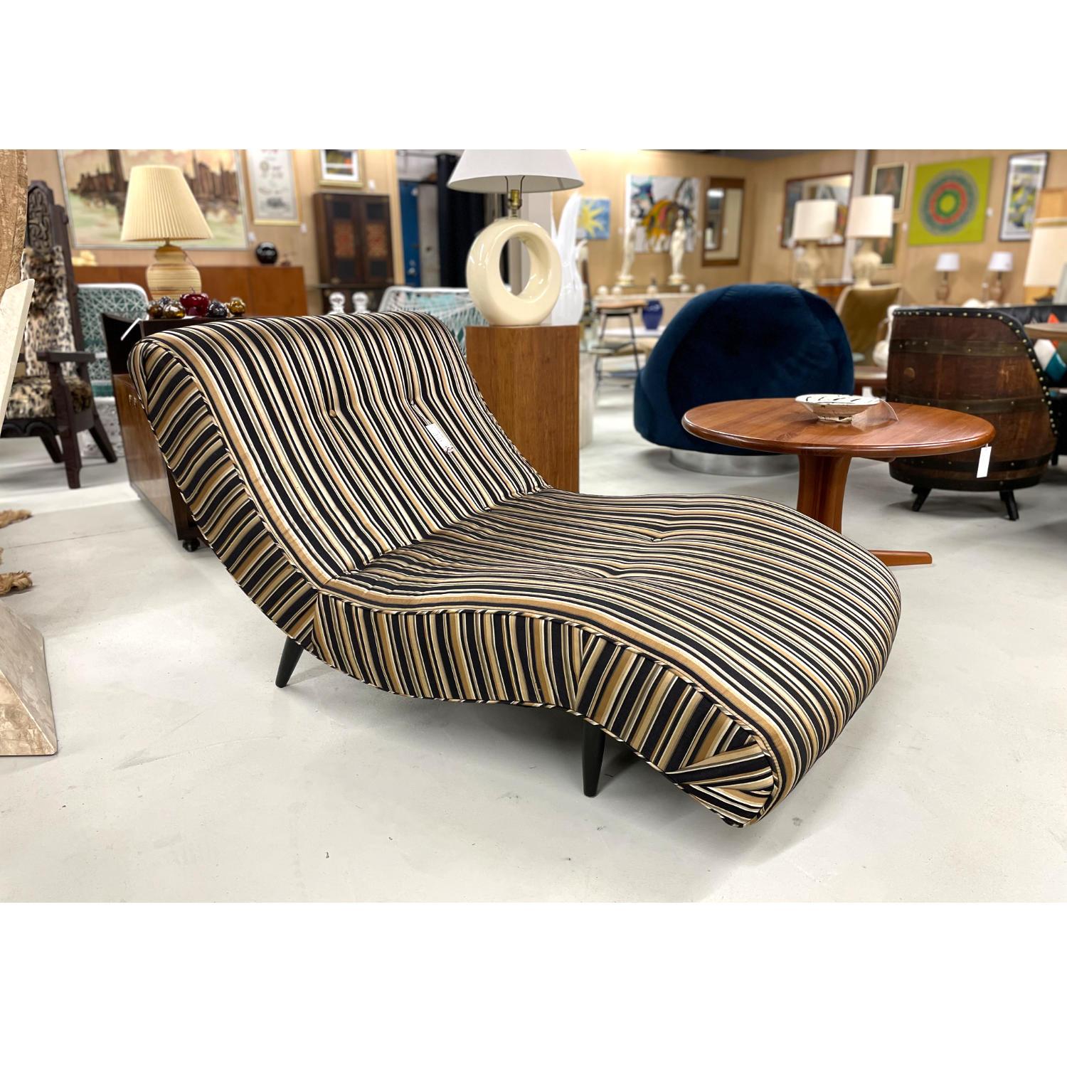 Adrian Pearsall wave lounge chair. Big enough to stand alone as a sofa like seating solution. Imagine yourself reclining in this Mid-Century Modern darling while watching one of your favorite Hitchcock movies. This is atomic age seating with