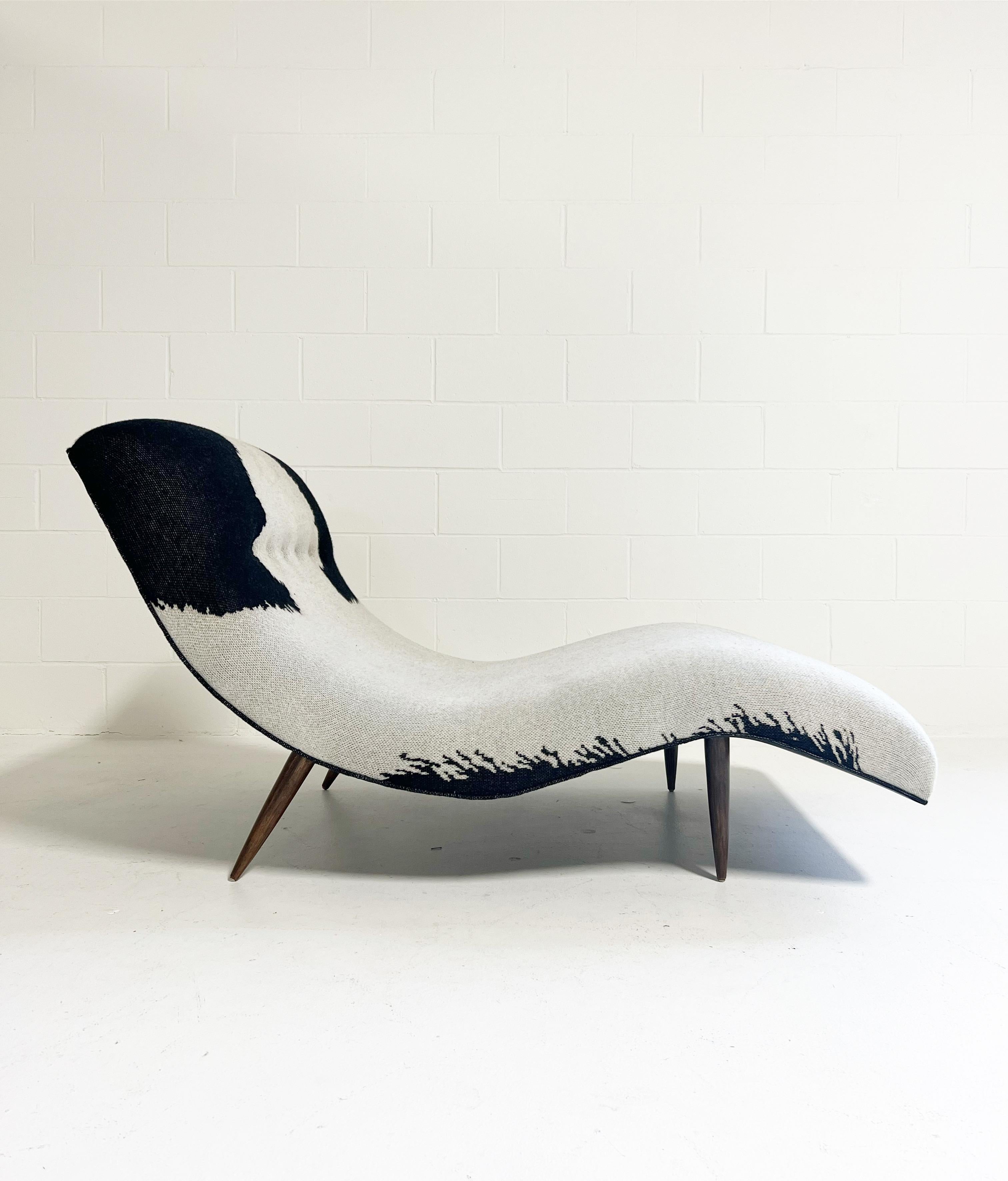This is an original Adrian Pearsall wave chaise lounge. Adrian Pearsall began his career as an architect but dabbled in furniture design, quickly becoming a leader in the modernist furniture movement. We upholstered the lounge with a cashmere throw