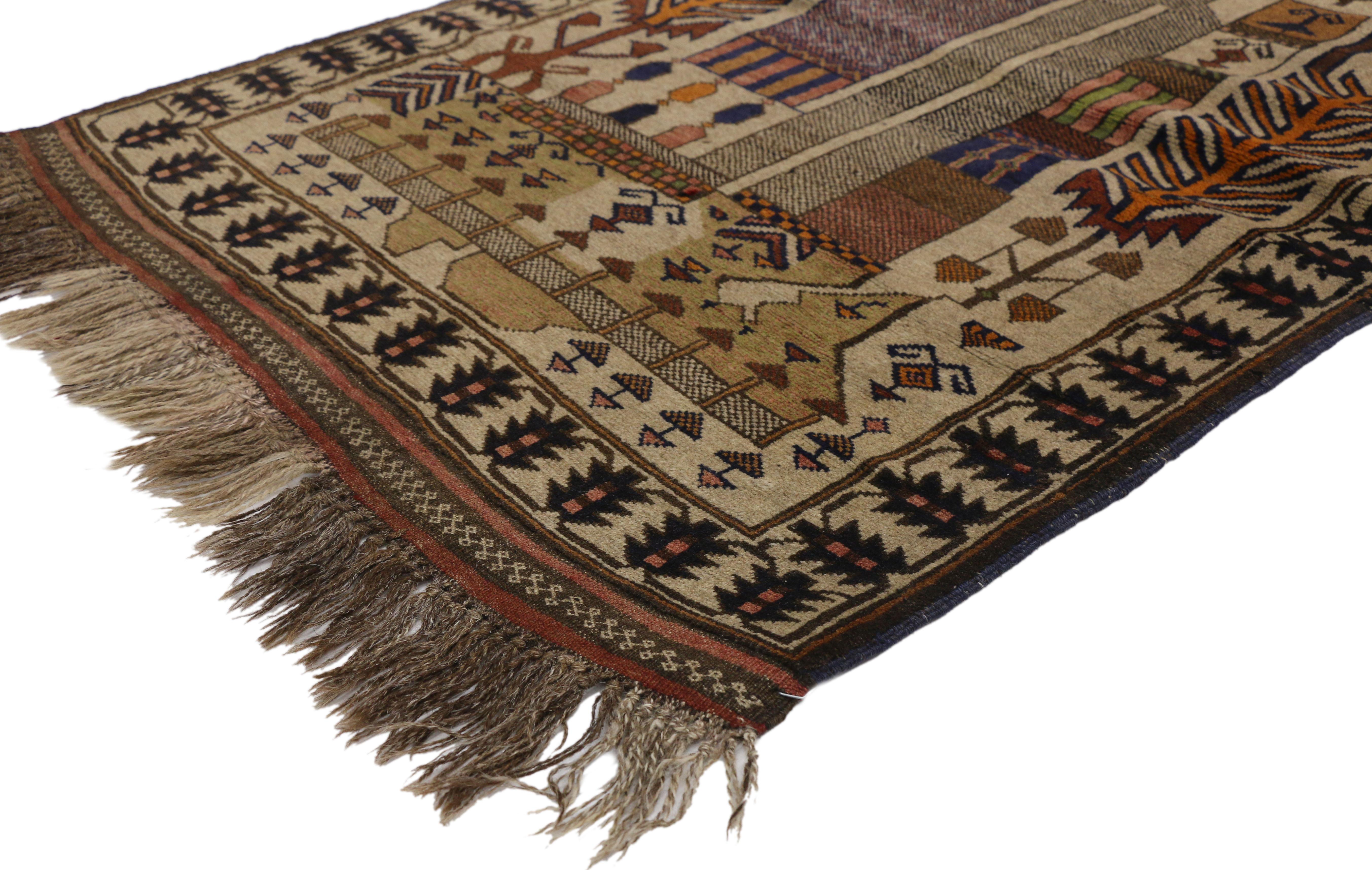 74665, vintage Afghan Balouch War rug with Tribal Nomadic style. This hand knotted wool vintage Afghan Balouch War rug possibly depicts a scene of the Minaret of Jam surrounded by geometric motifs possibly representing land mines, grenades, mines,