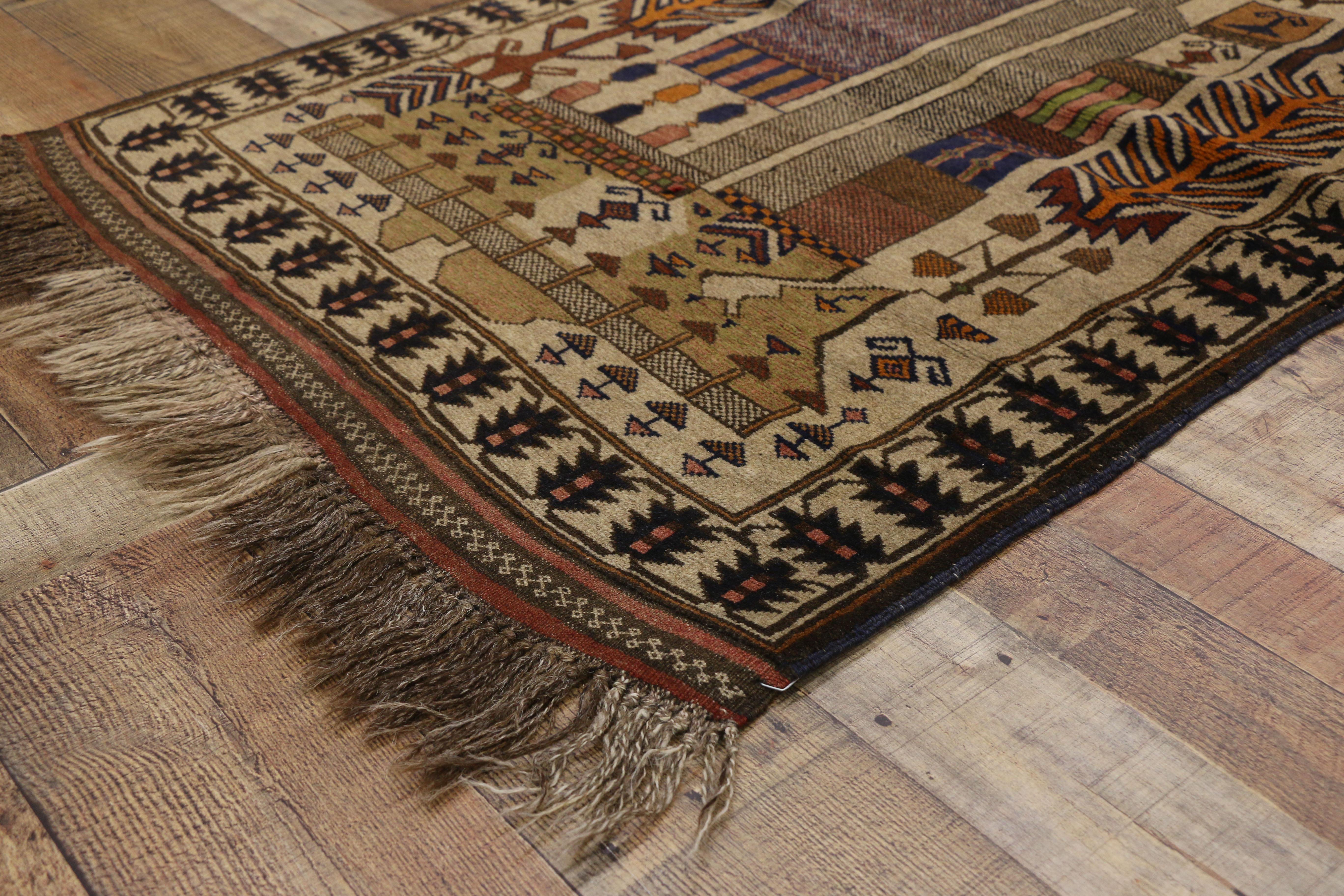 Wool Vintage Afghan Balouch War Rug with Tribal Nomadic Style For Sale