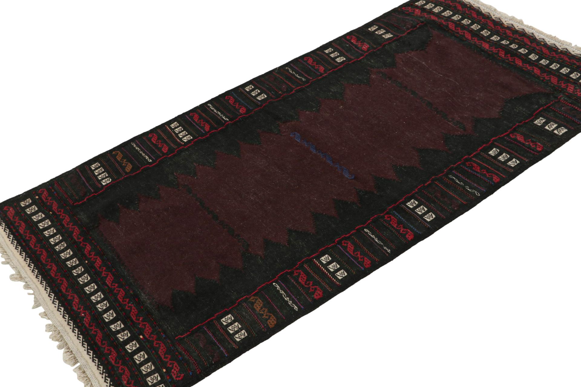 Handwoven in wool, this 3x5 vintage Afghan Baluch tribal kilim runner rug, circa 1950-1960, is an exquisite tribal piece that was often used as table covers in nomadic daily life, much similar to Persian Sofreh Kilims. 

On the Design: 

Tribal