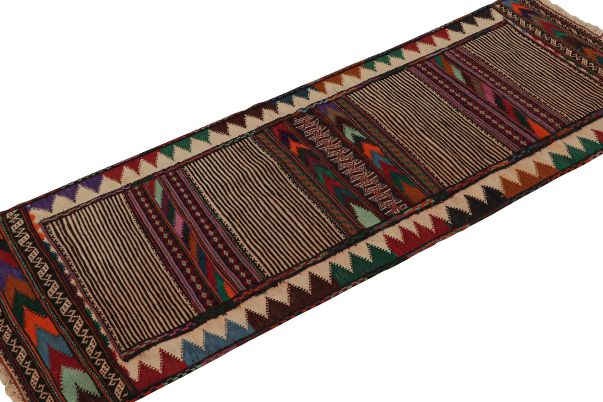 Handwoven in wool, this 2x6 vintage Afghan Baluch tribal kilim runner rug, circa 1950-1960, is an exquisite tribal piece that was often used as table covers in nomadic daily life, much similar to Persian Sofreh Kilims. 

On the Design: 

Tribal