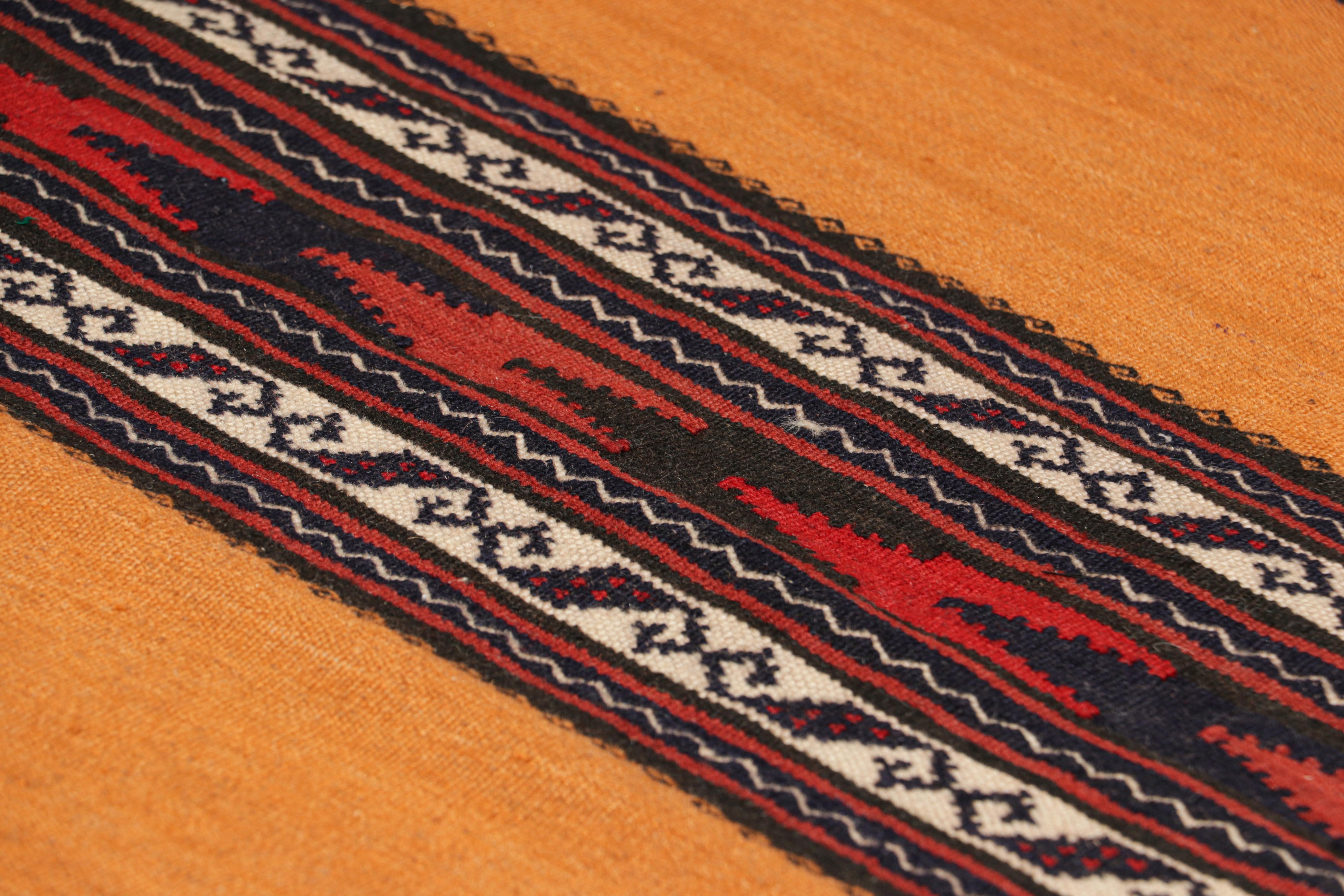 Handwoven in wool, circa 1950-1960, this 2x5 vintage Afghan tribal kilim, is a collectible tribal piece that may have been used as table covers in nomadic daily life, much similar to Persian Sofreh Kilims.

On the Design: 

Drawing on Afghan tribal