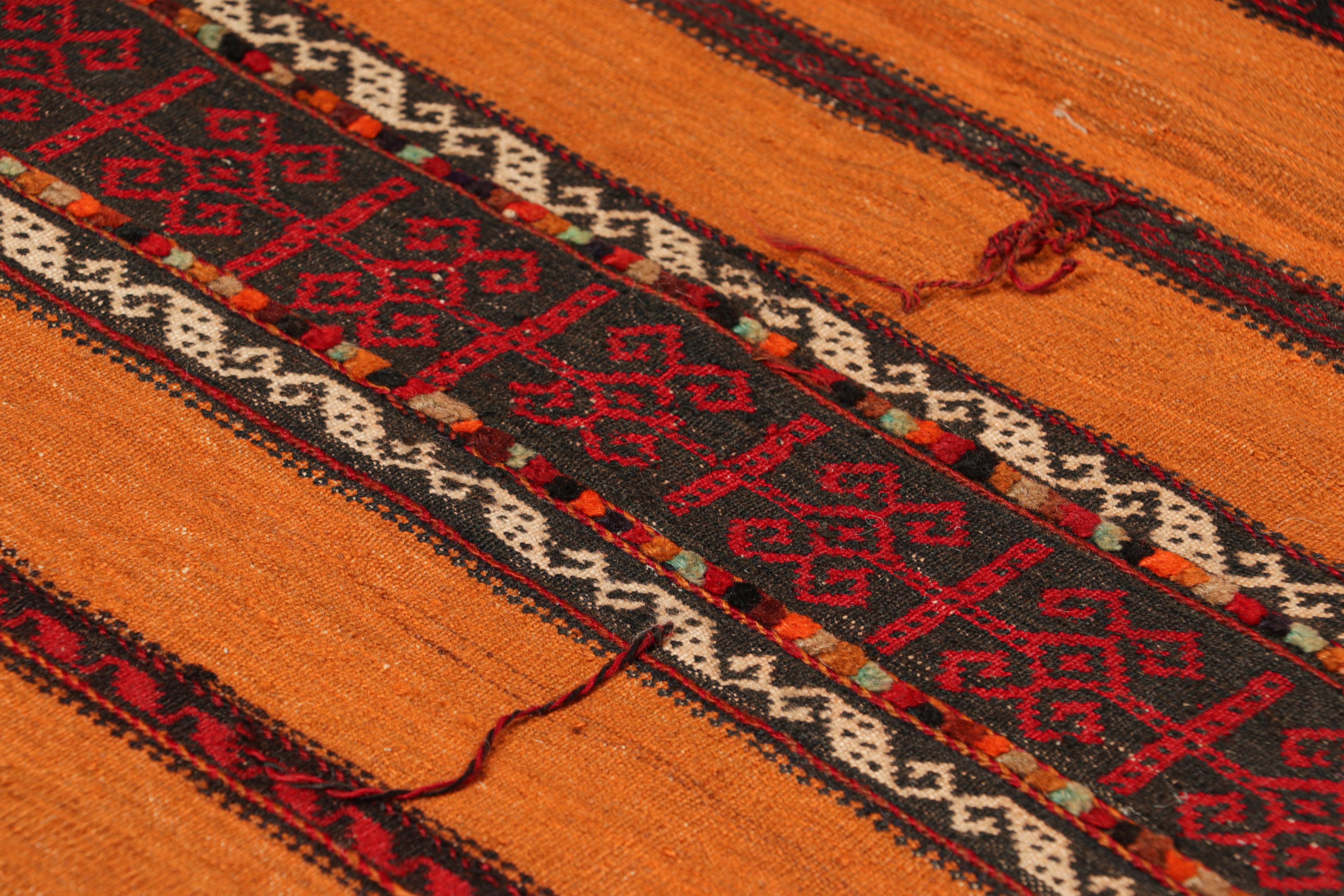Handwoven in wool, circa 1950-1960, this 2x5 vintage Afghan tribal kilim, is a collectible tribal piece that may have been used as table covers in nomadic daily life, much similar to Persian Sofreh Kilims.

On the Design: 

Drawing on Afghan tribal