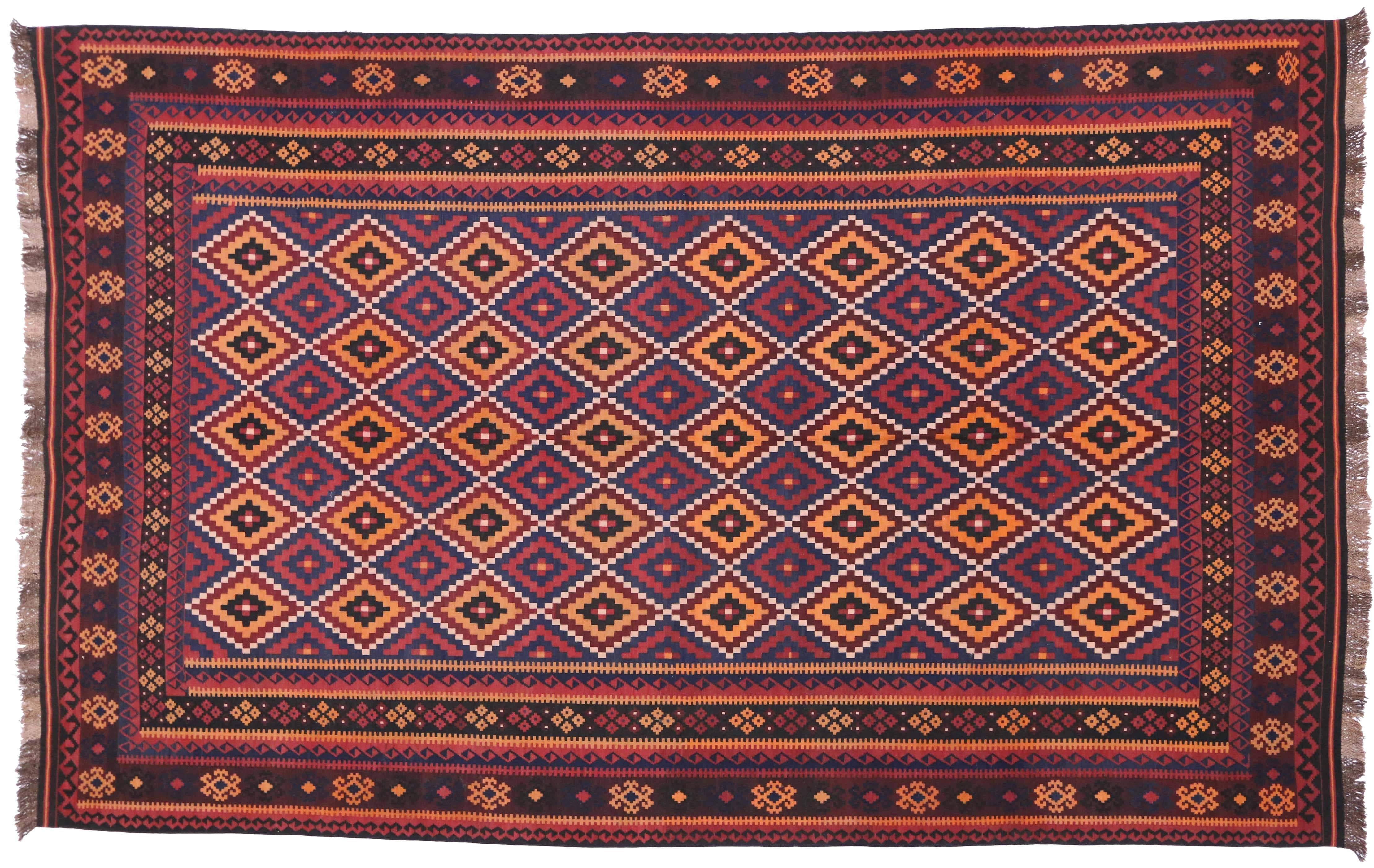 74276, vintage Afghan Kilim rug with modern tribal style. Boasting a stunning tribal design and modern style, this vintage Afghan Kilim rug shows its age beautifully. From variegated shades of brick red, wine, orange, navy blue and coffee, the