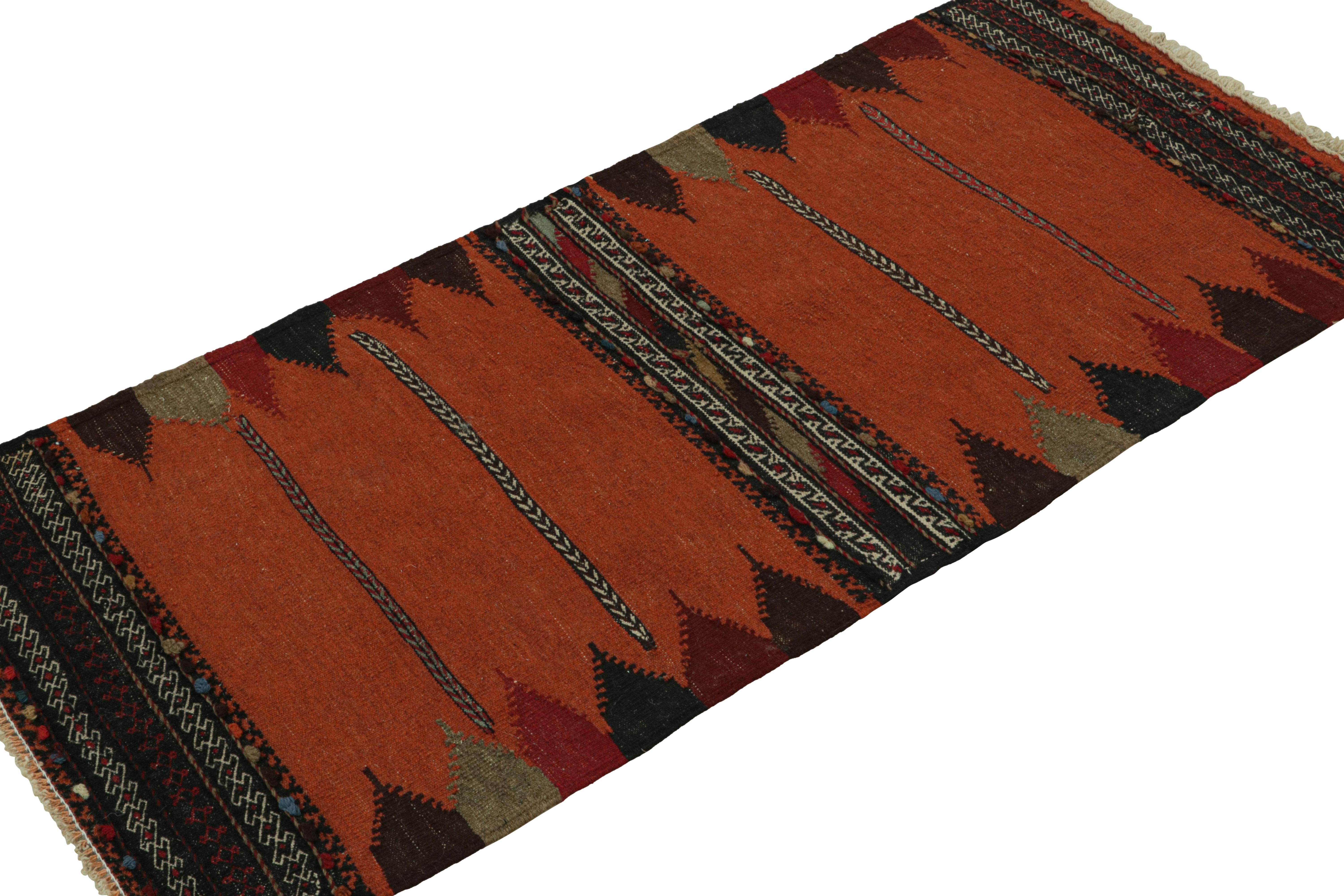 Handwoven in wool, this 2x5 vintage Afghan tribal kilim scatter rug, circa 1950-1960, is an exquisite tribal addition to the Rug & Kilim collection.  

On the Design: 

Drawing on Afghan tribal sensibilities, this archaic piece of art exhibiting an