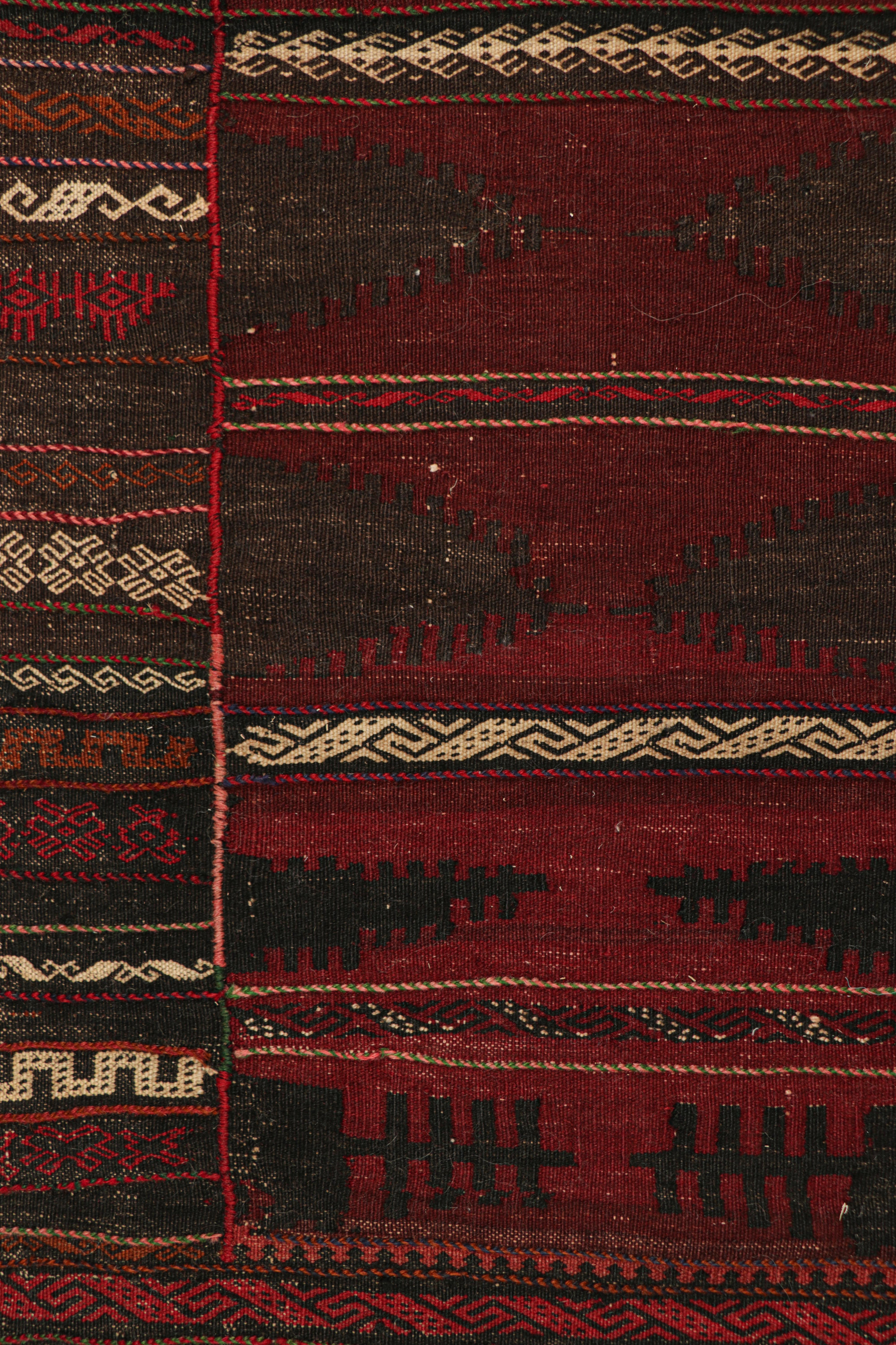 Handwoven in wool, circa 1950-1960, this 2×5 vintage Afghan tribal kilim, is a collectible tribal piece that may have been used as table covers in nomadic daily life, much similar to Persian Sofreh Kilims.

On the Design: 

Drawing on Afghan tribal