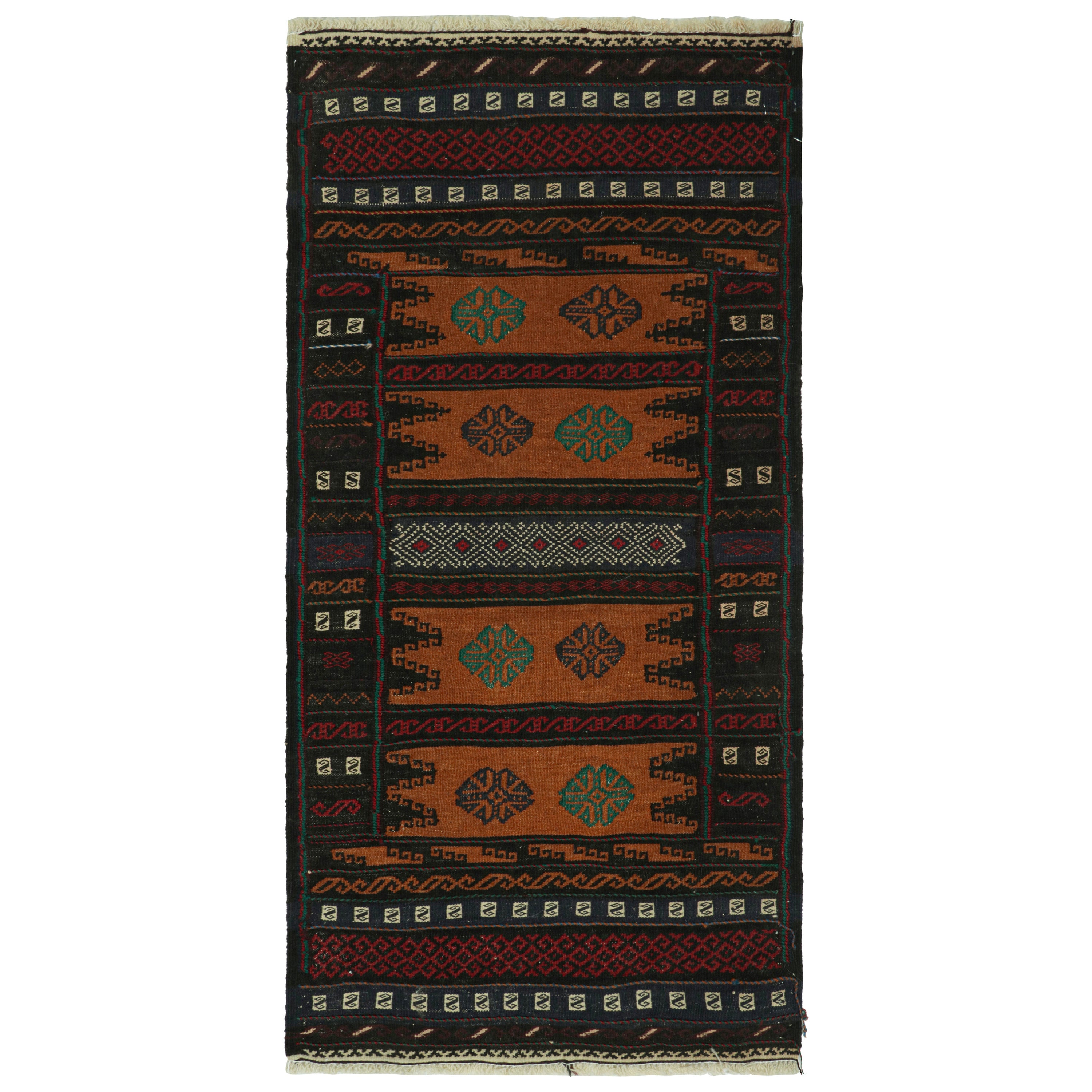 Kilim afghan vintage à motifs géométriques polychromes, de Rug & Kilim