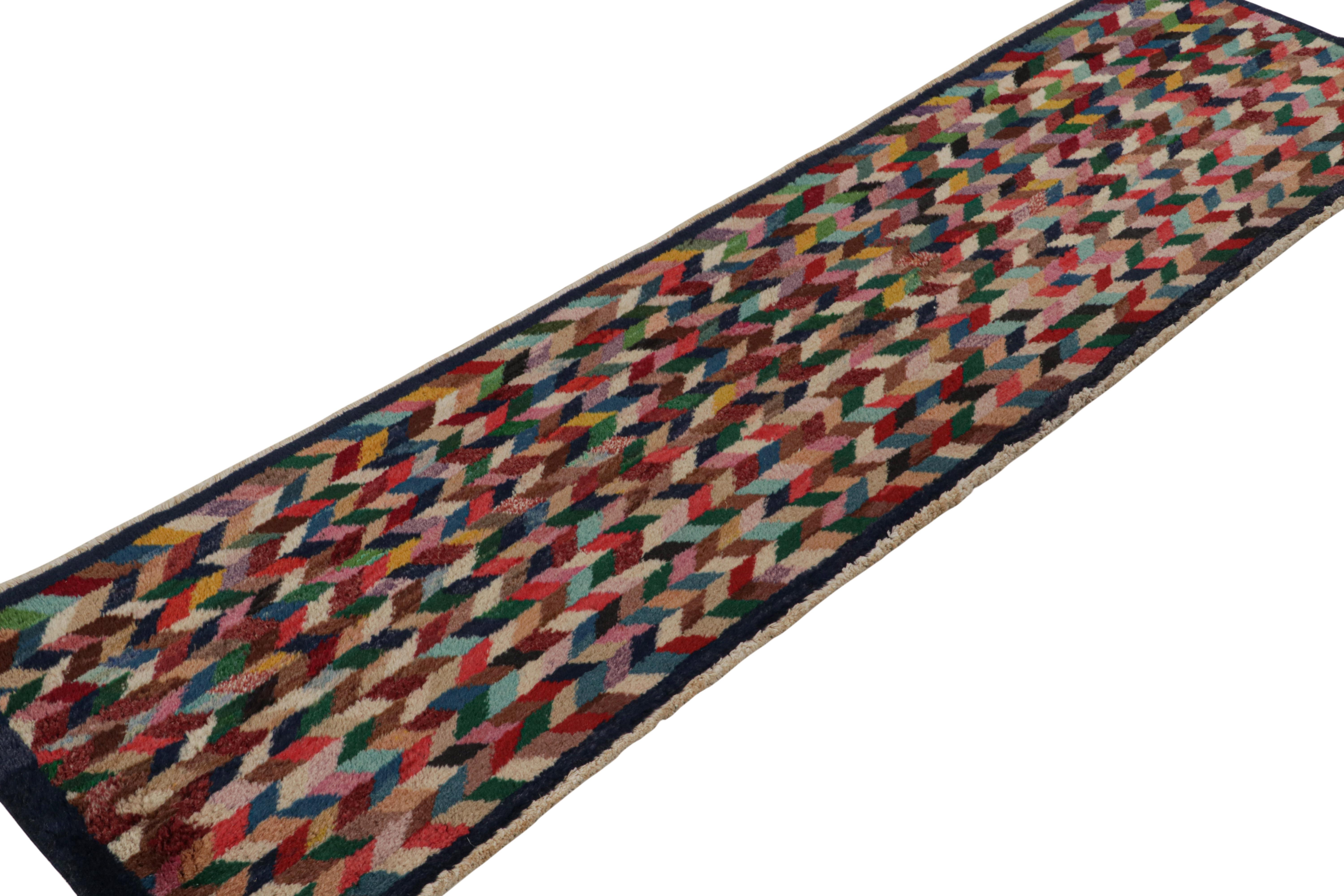 Hand-knotted in wool, this 2x8 vintage Afghan polychromatic runner rug has colorful geometric patterns all over the field. Its design is very distinct given its blend of nomadic and modern sensibilities. 

On the Design: 

Connoisseurs will