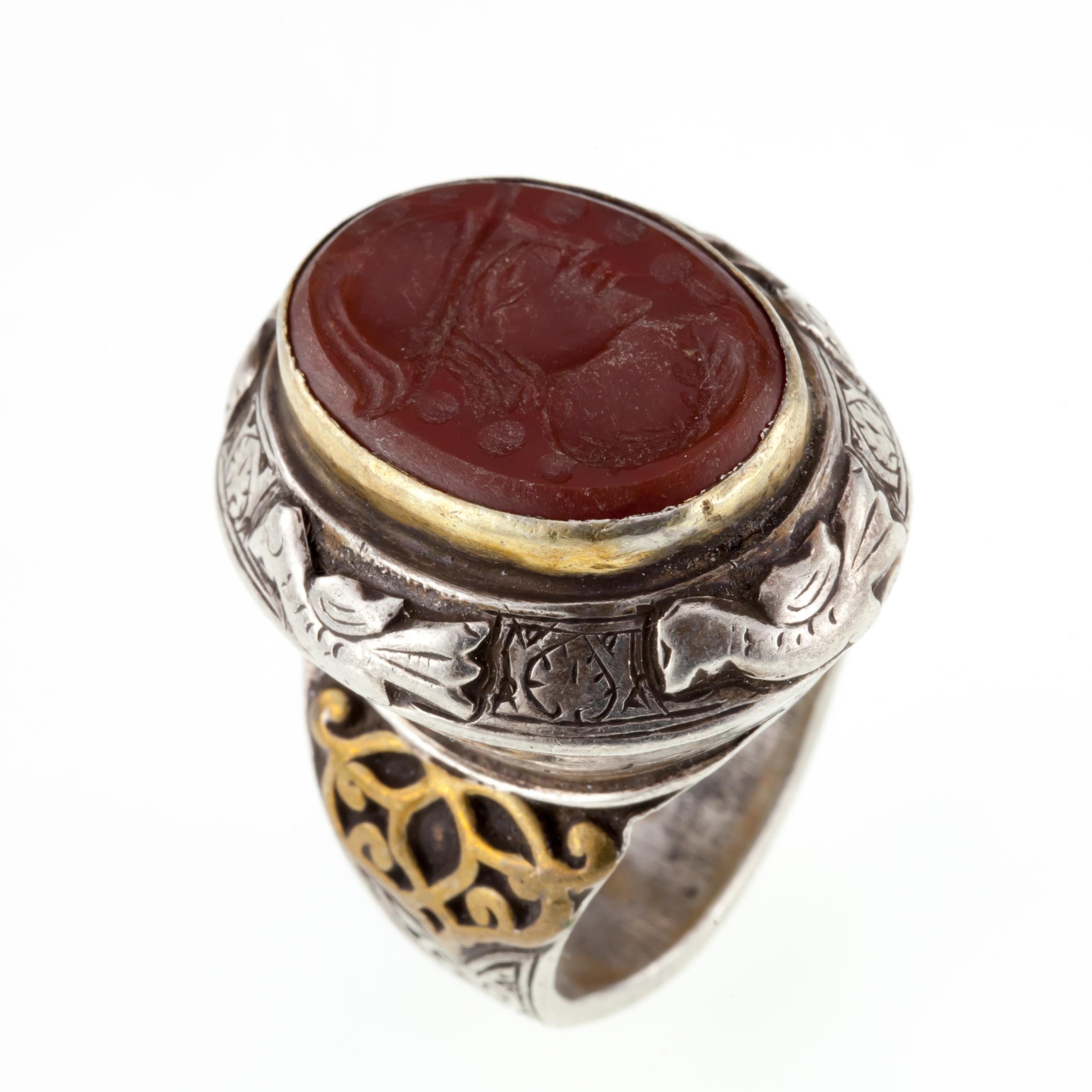 Gorgeous Afghan Intaglio Ring
Features Intricate Repousse Design with Antiqued Accents
Size 9.25
Dimensions of Carnelian = 22 mm x 16 mm
Dimensions of Plaque = 29 mm x 25 mm
Total Mass = 24.8 grams